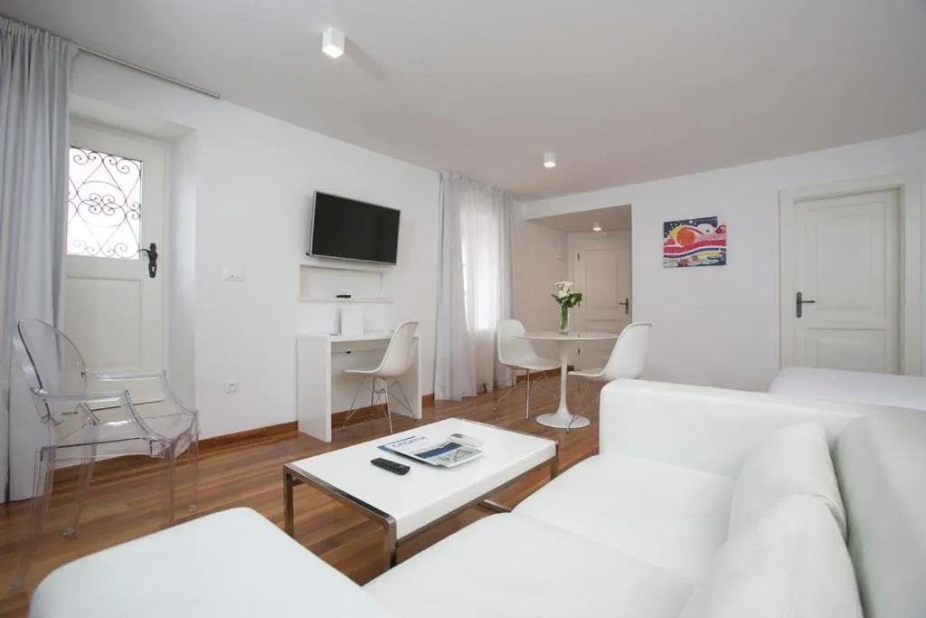 Bed in Divota Apartment Hotel