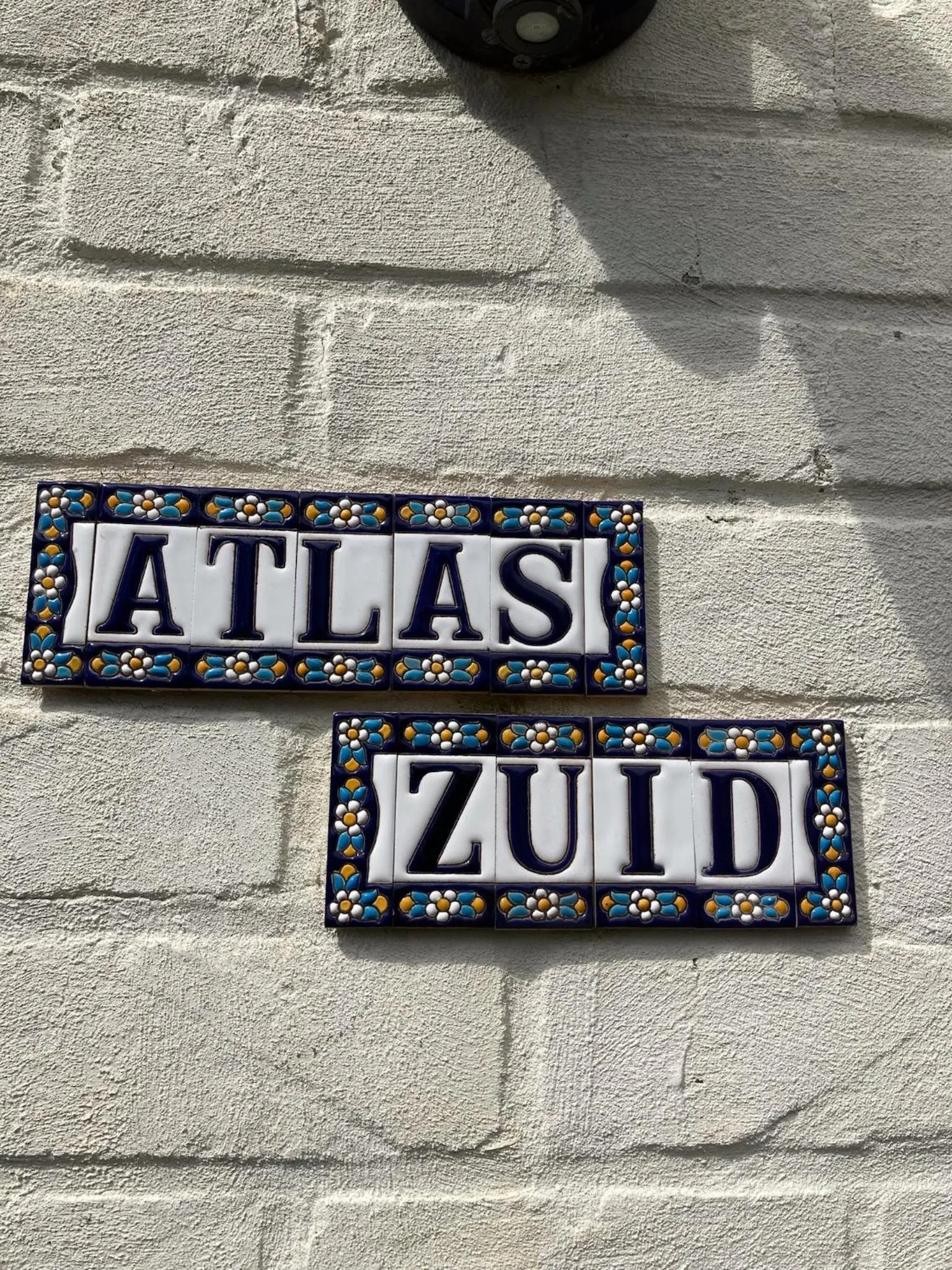 Logo/Certificate/Sign in Atlas Guesthouse