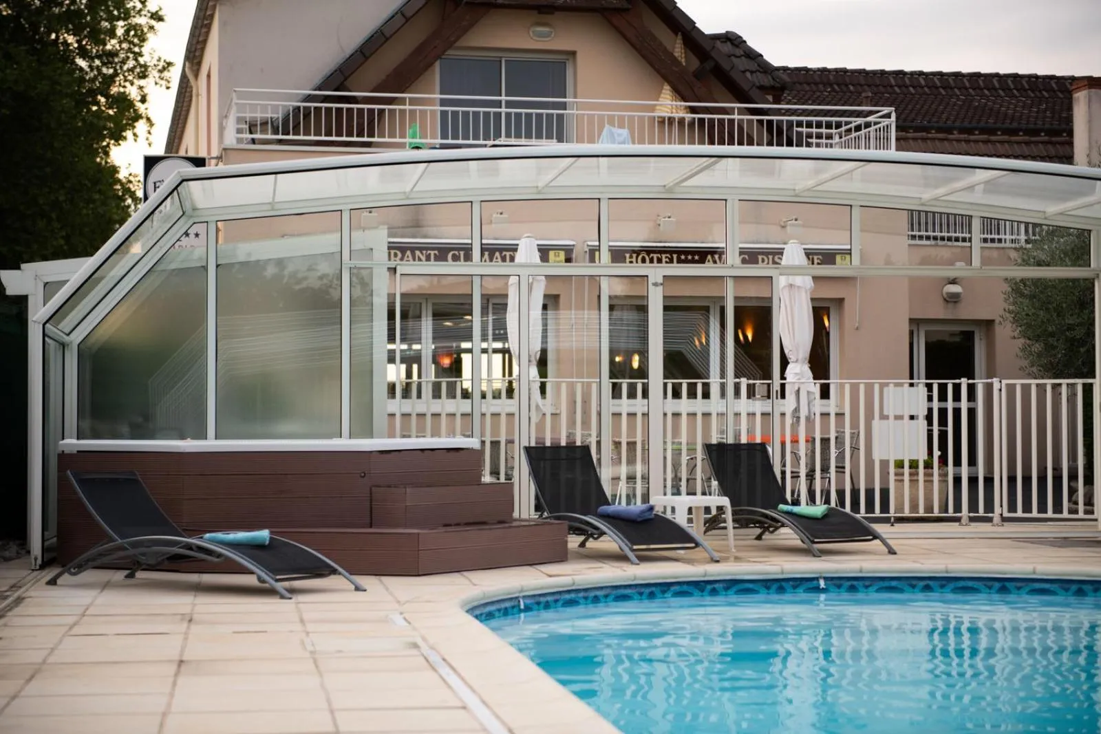 Property building in Logis Hotel Restaurant L'Escapade