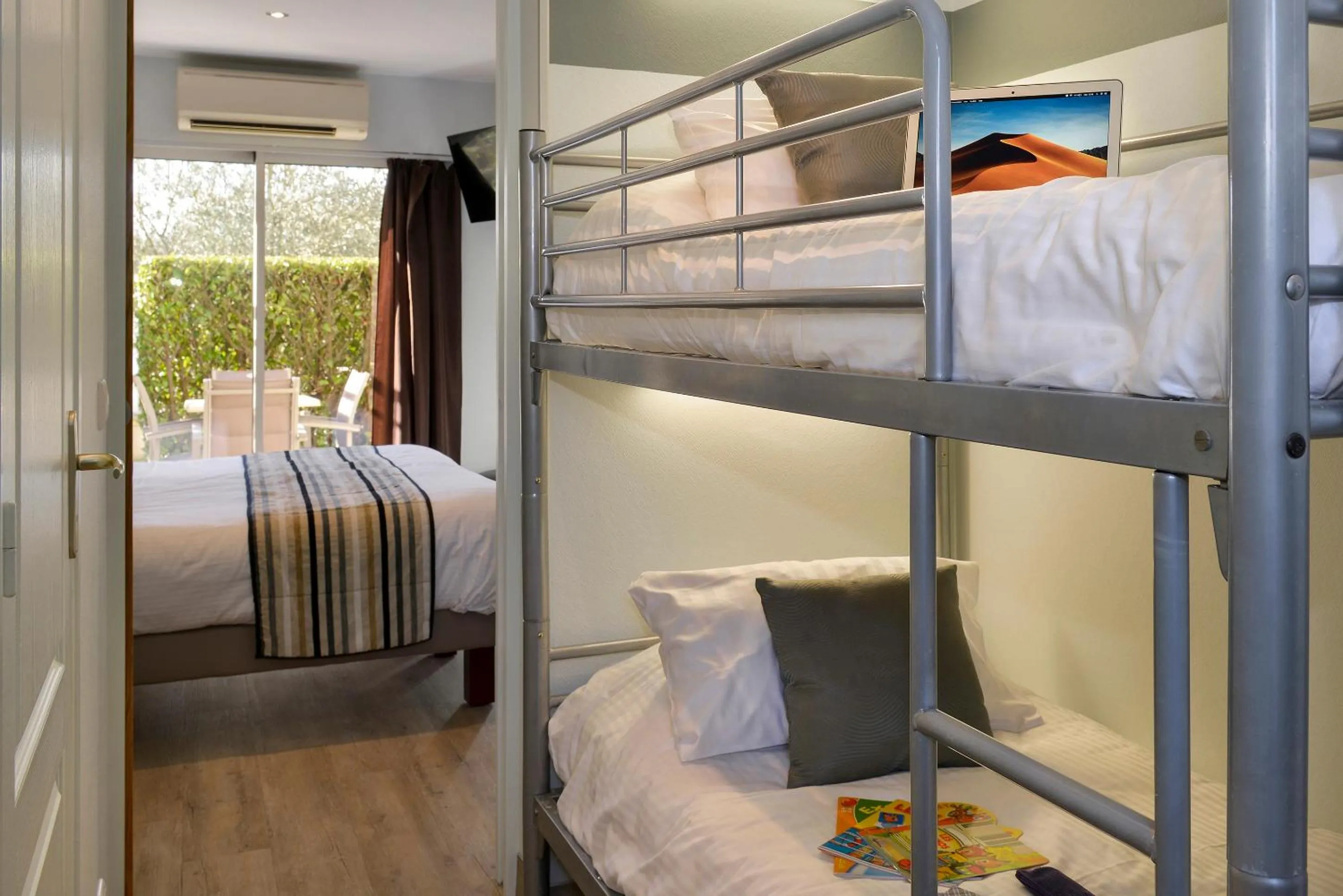 Patio, Bed in Logis Hotel Restaurant L'Escapade