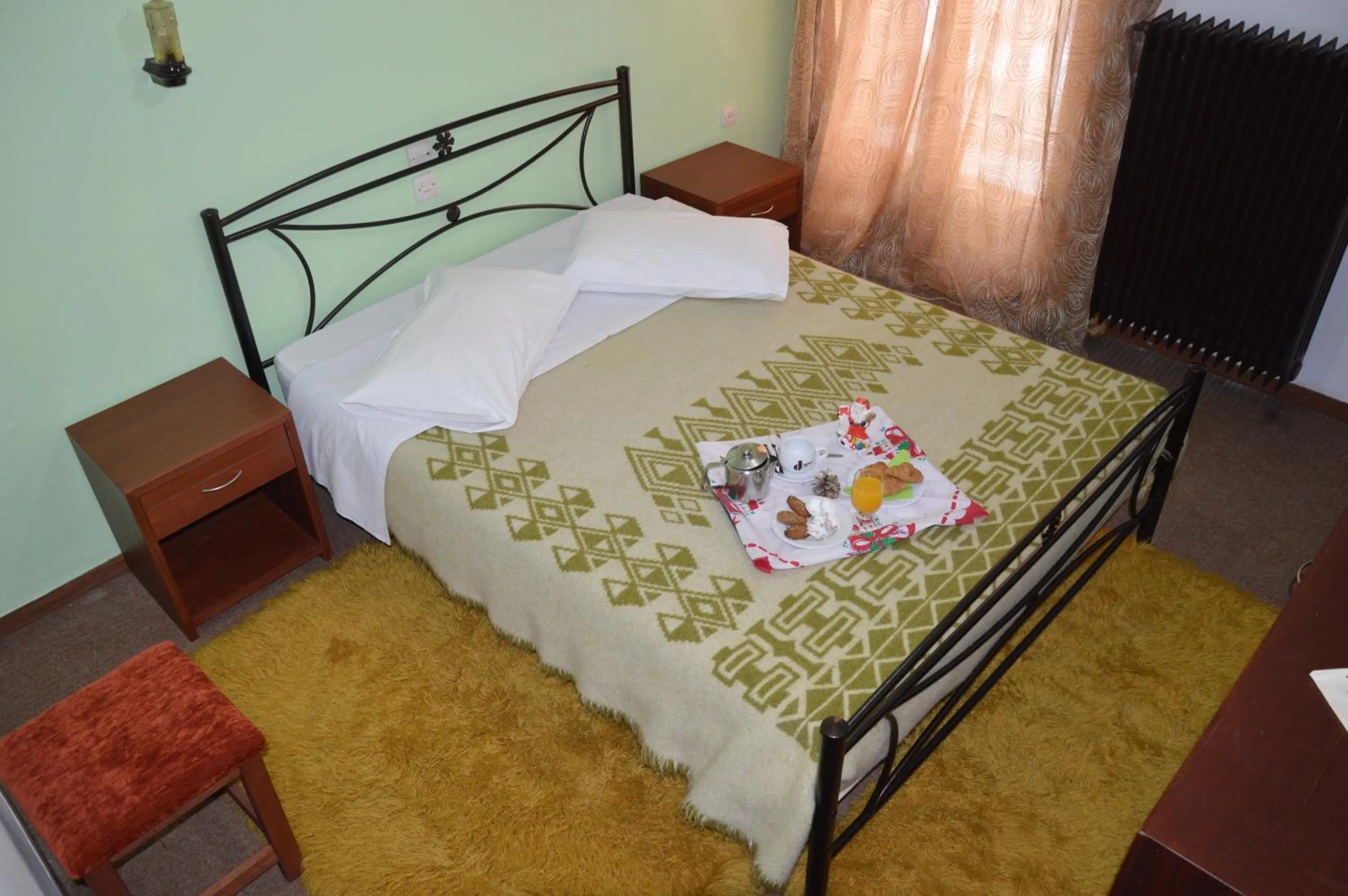 Bed in Hotel Hani Zisi