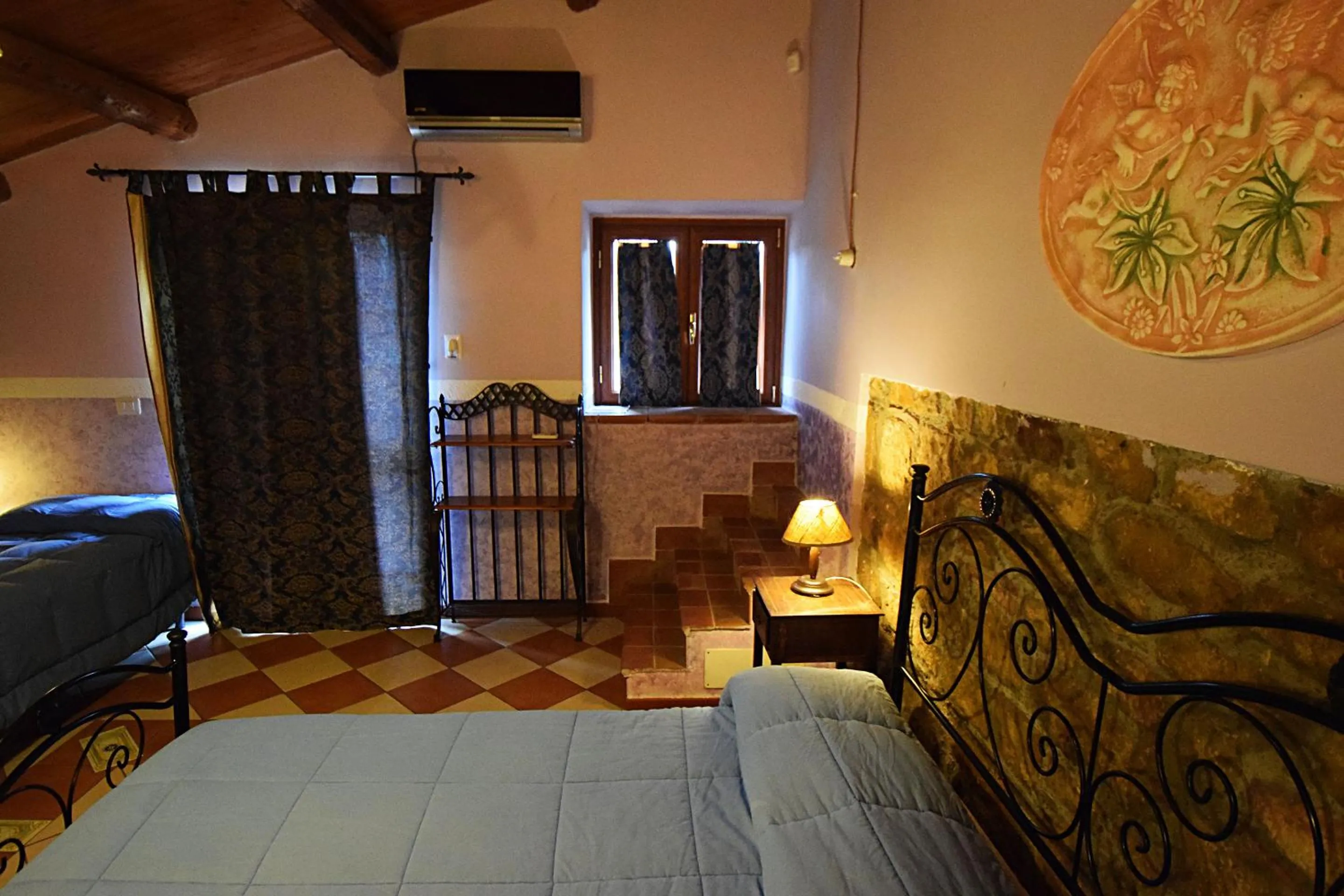 Photo of the whole room, Bed in Giucalem La Casa Negli Orti