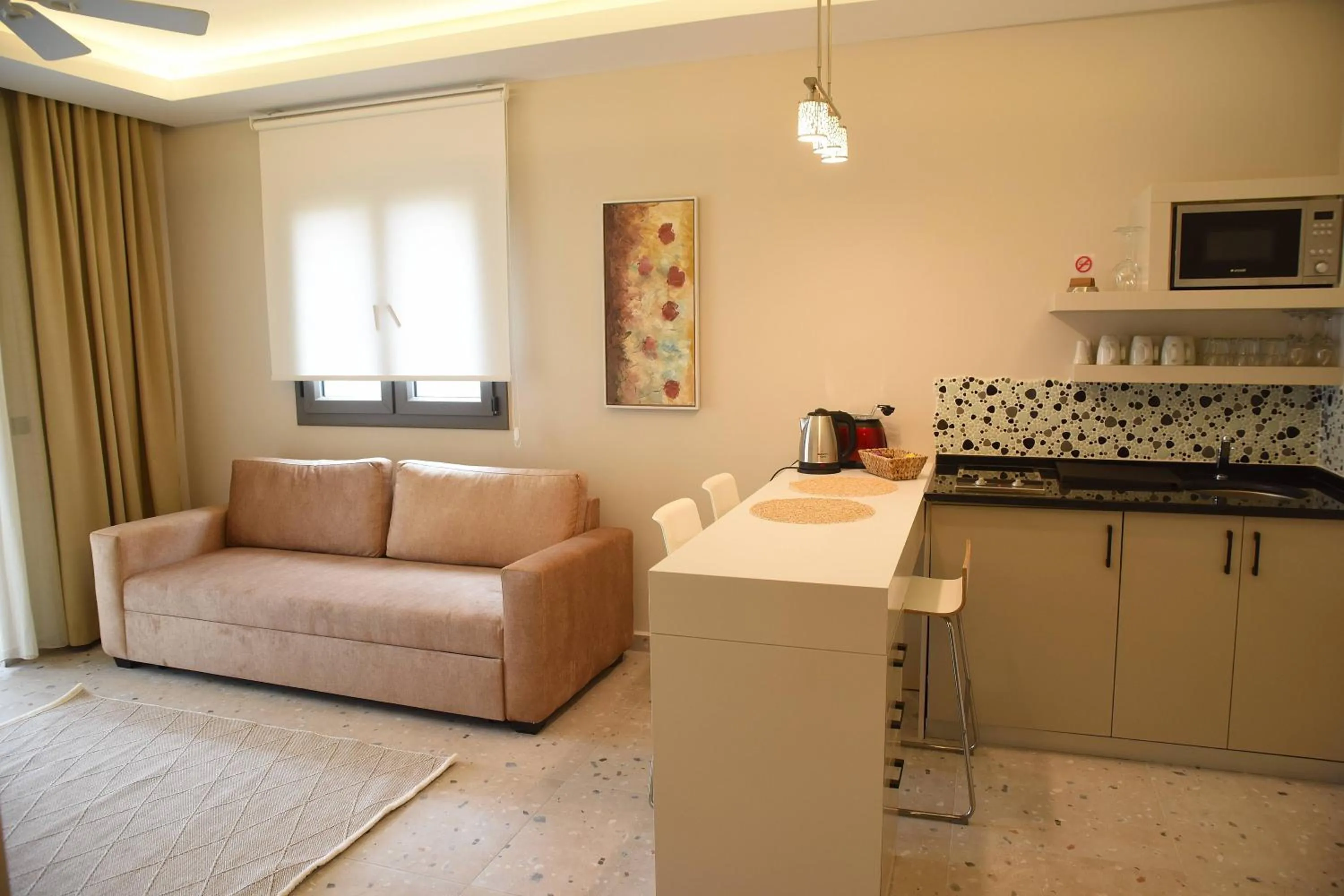 Kitchen or kitchenette in Mozaik Hotel