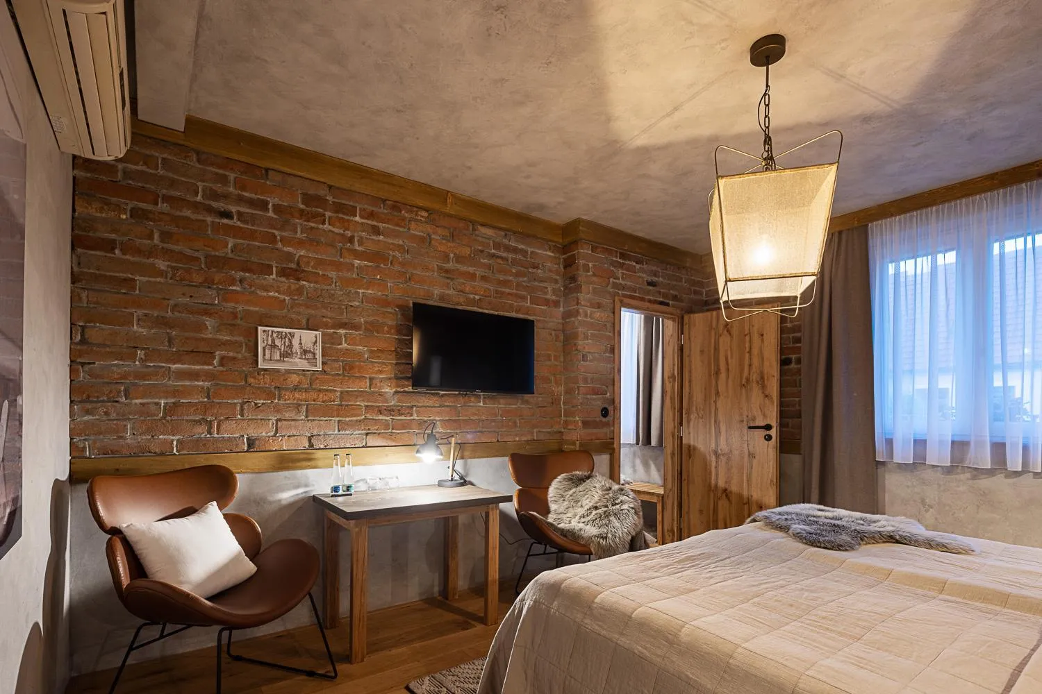 Living room, Bed in Hotel McLimon