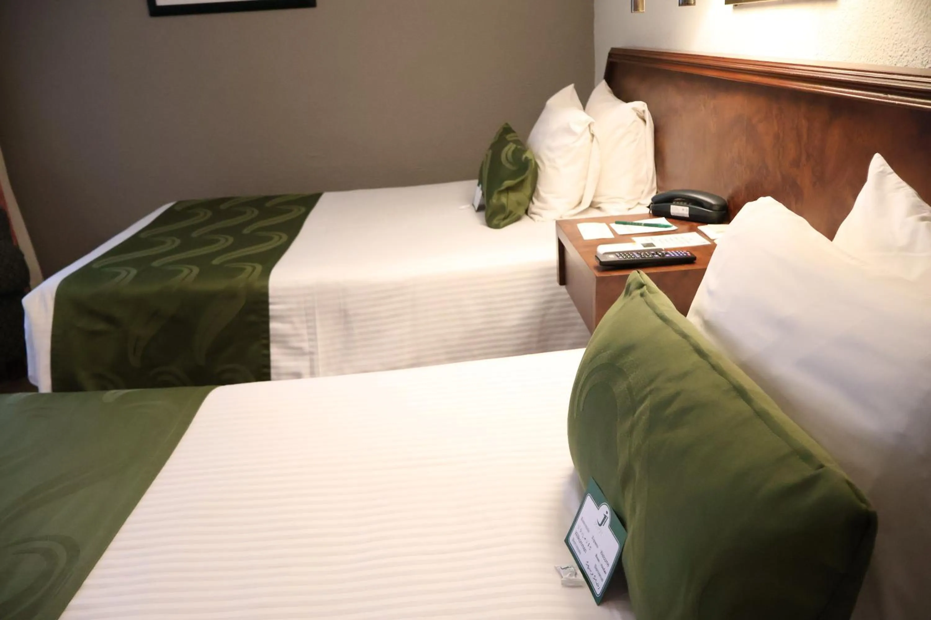 Bed in Hotel La Joya Tulancingo