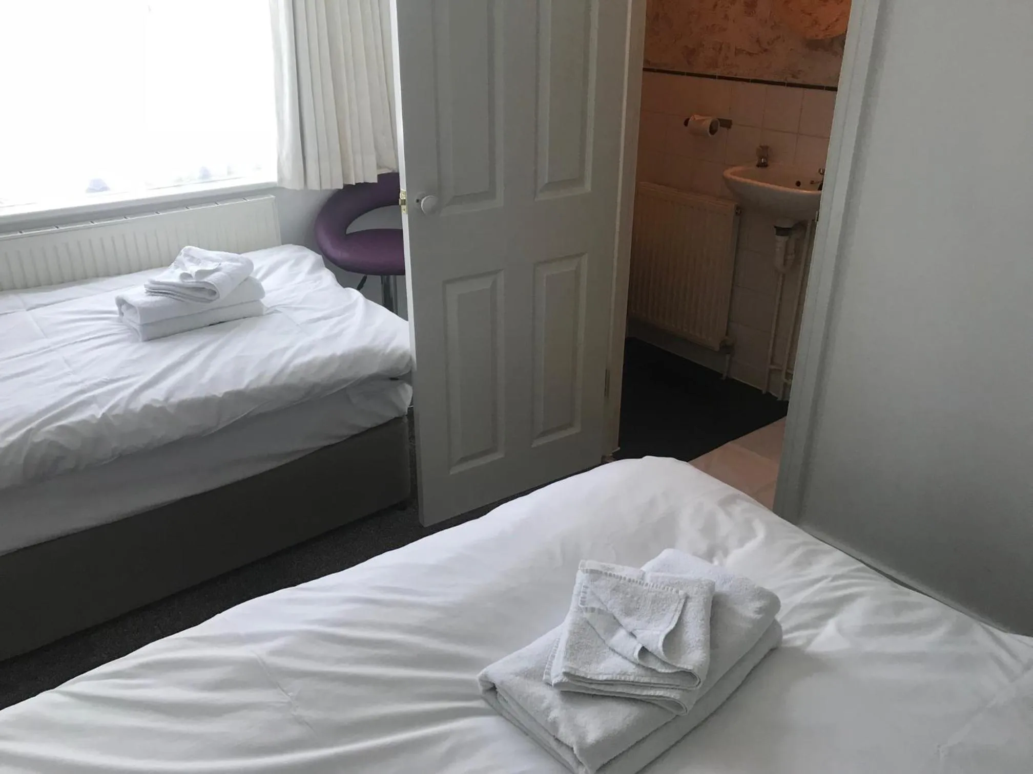 Bed in Loughborough Grange Guesthouse & Spa Treatments