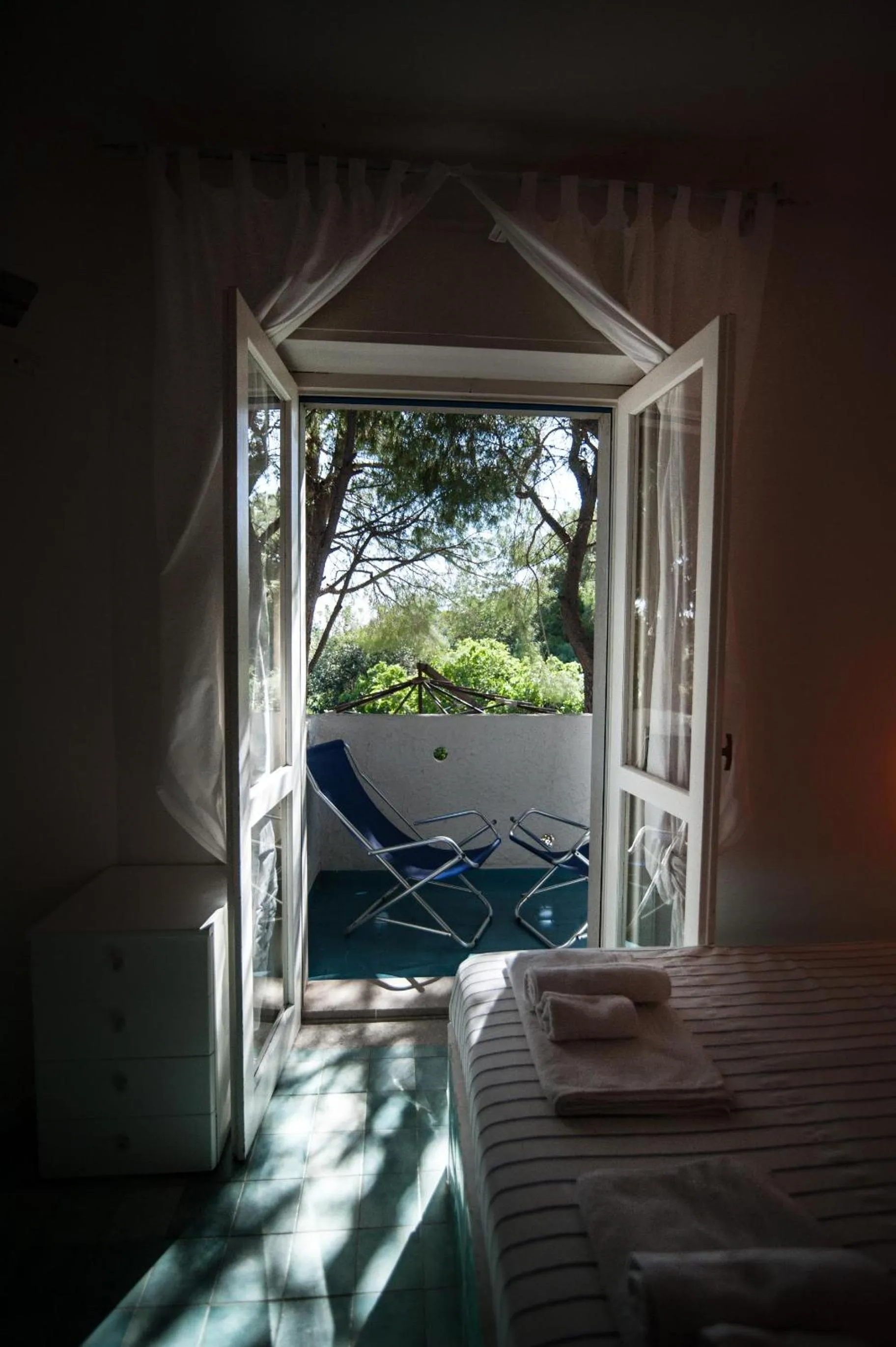 Garden view, Bed in Suite House L'Isola Che Non C'è