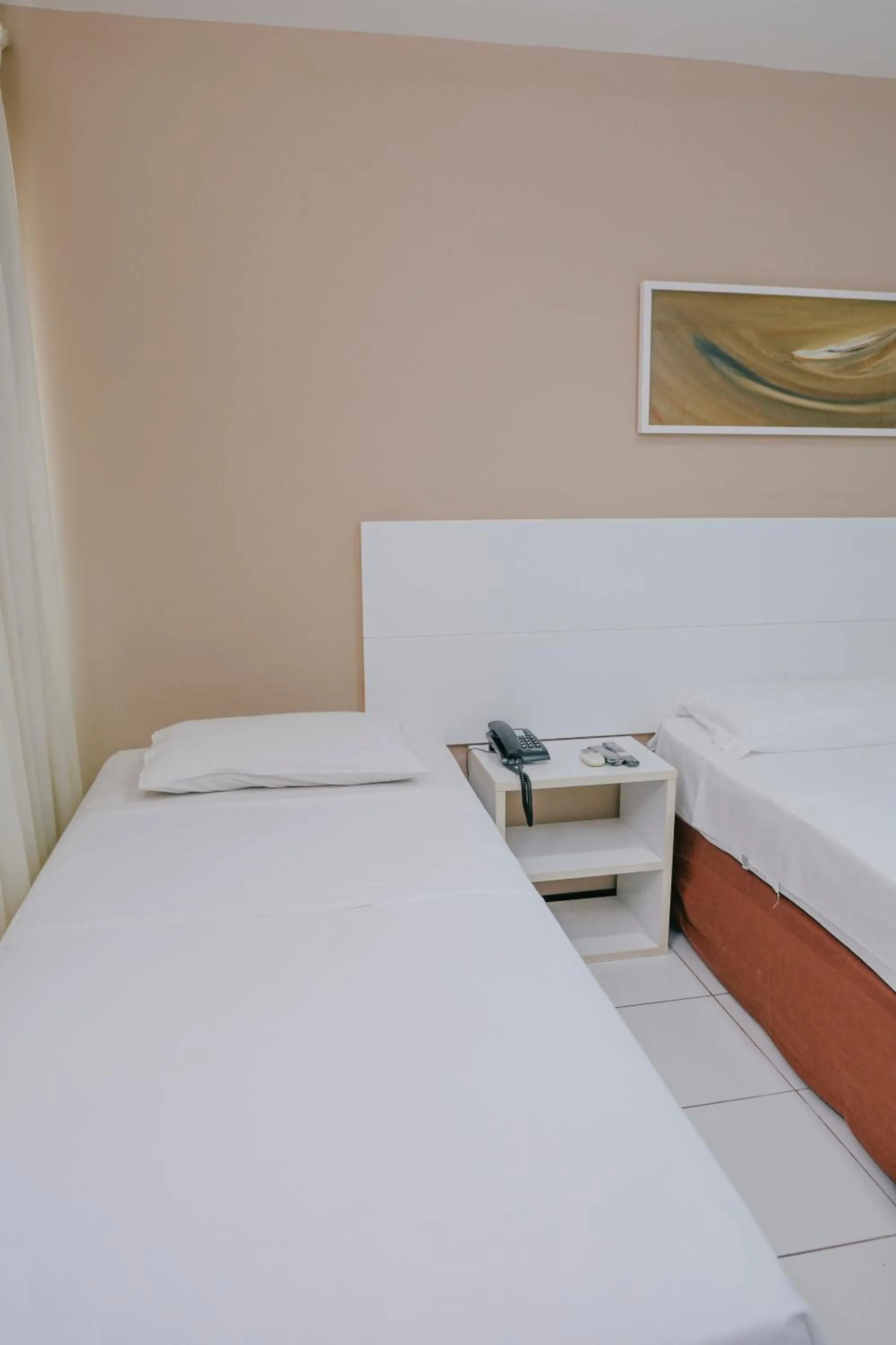 Bed in SLZ Lagoa Hotel