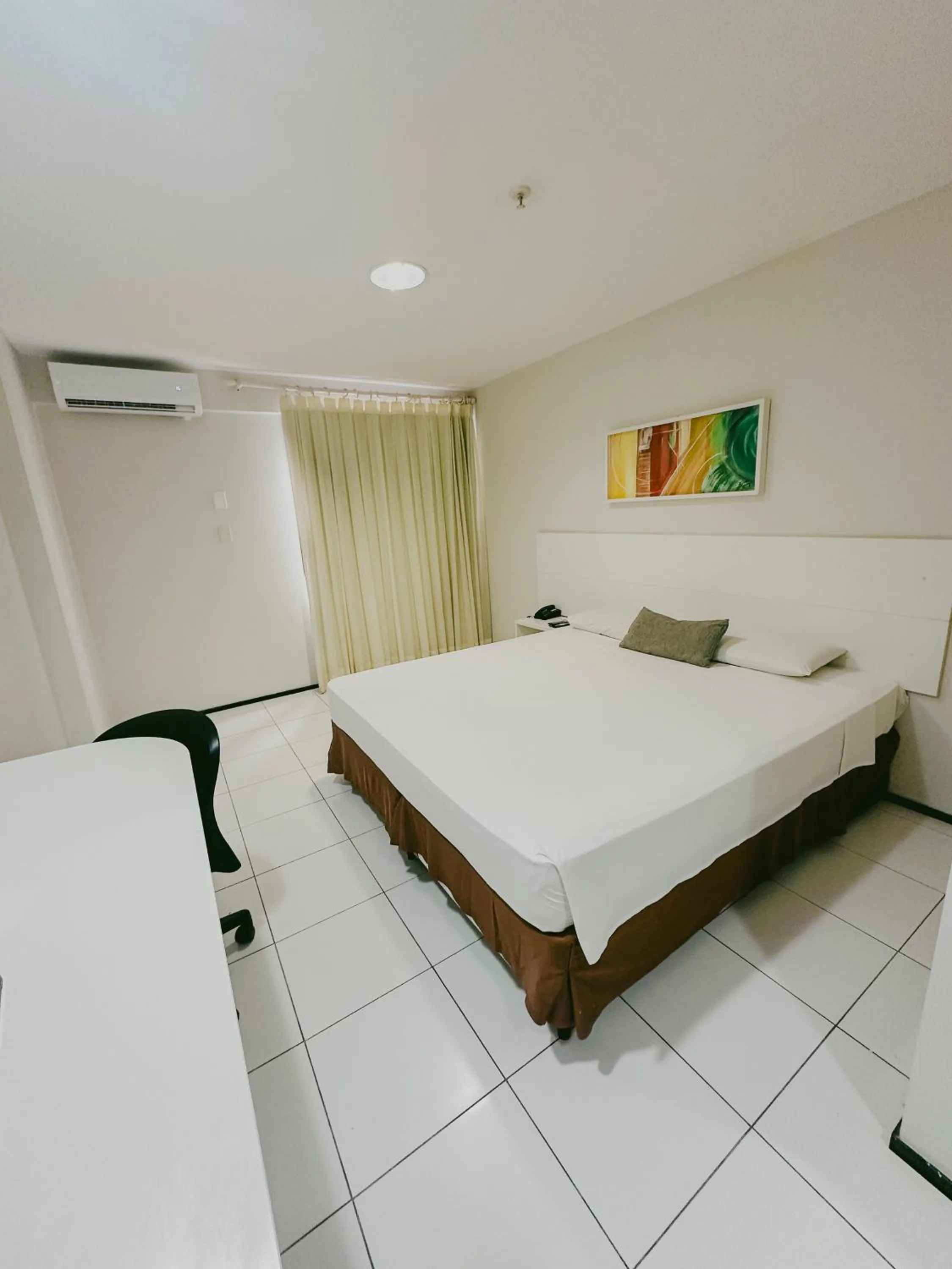 Bed in SLZ Lagoa Hotel