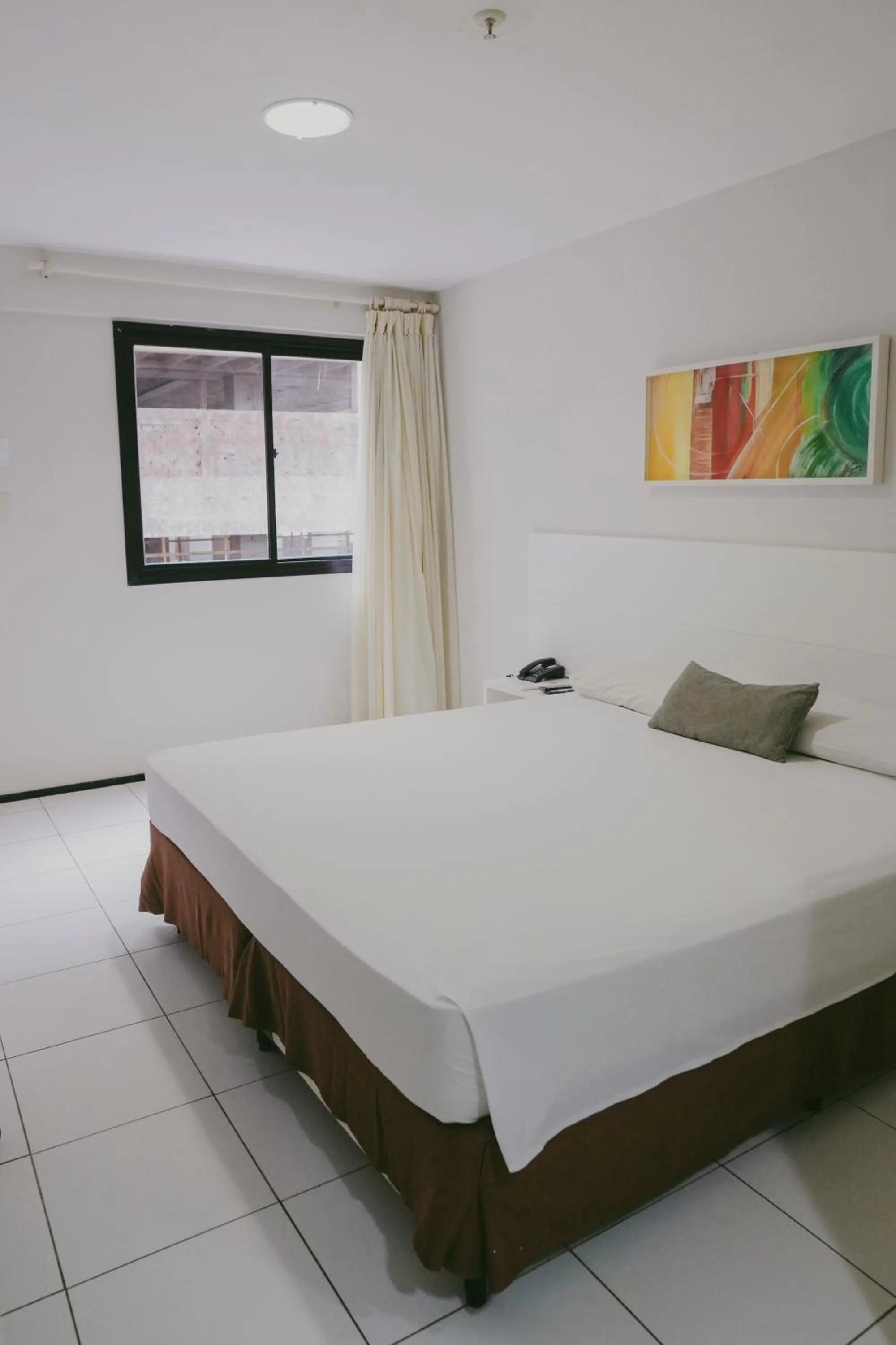 Bed in SLZ Lagoa Hotel