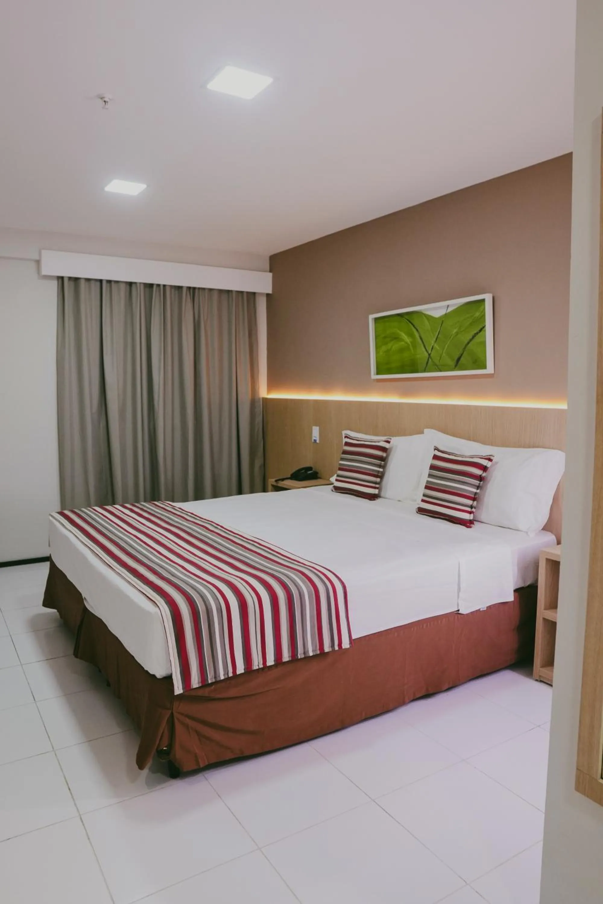 Bed in SLZ Lagoa Hotel