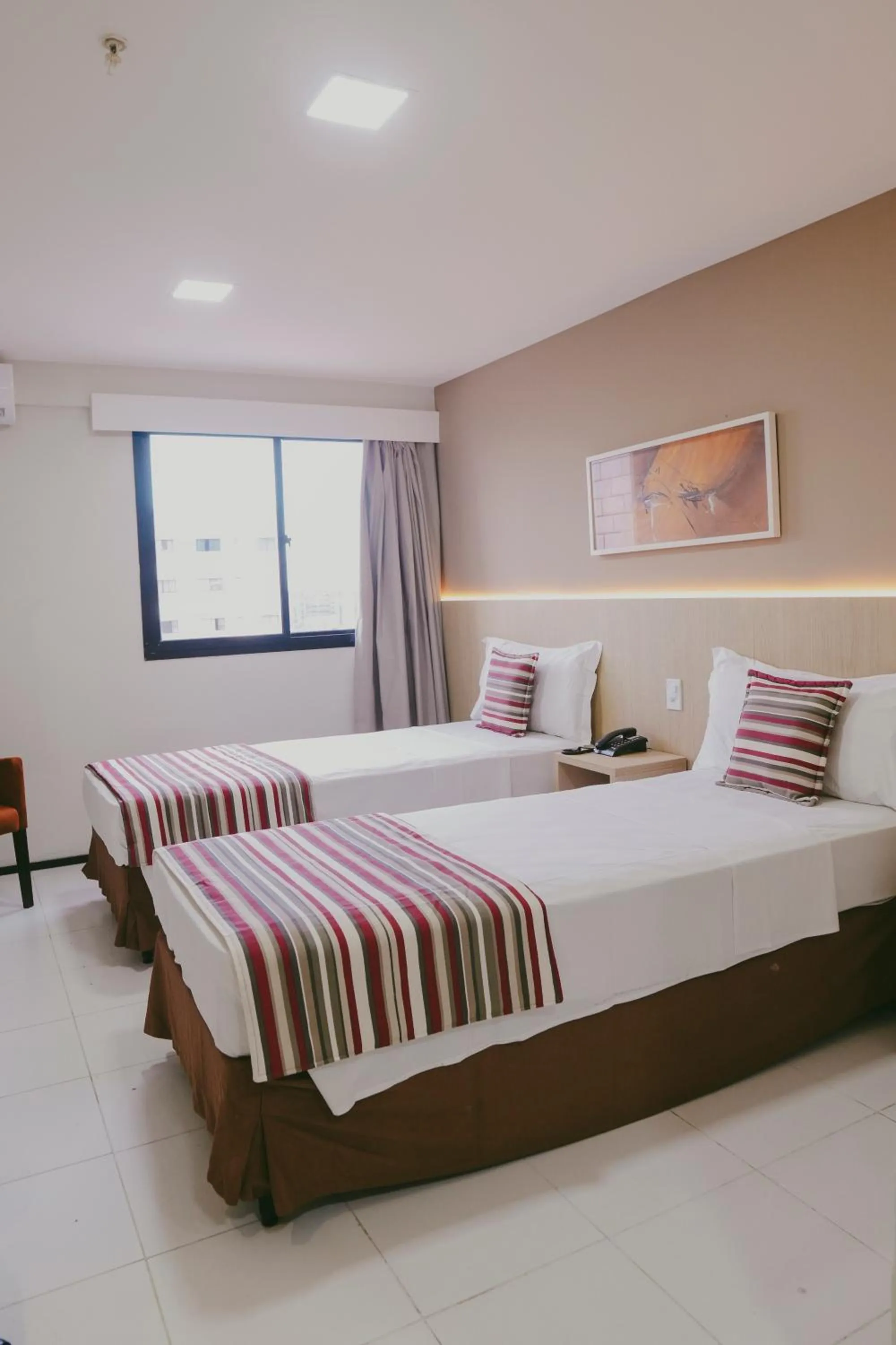 Bed in SLZ Lagoa Hotel