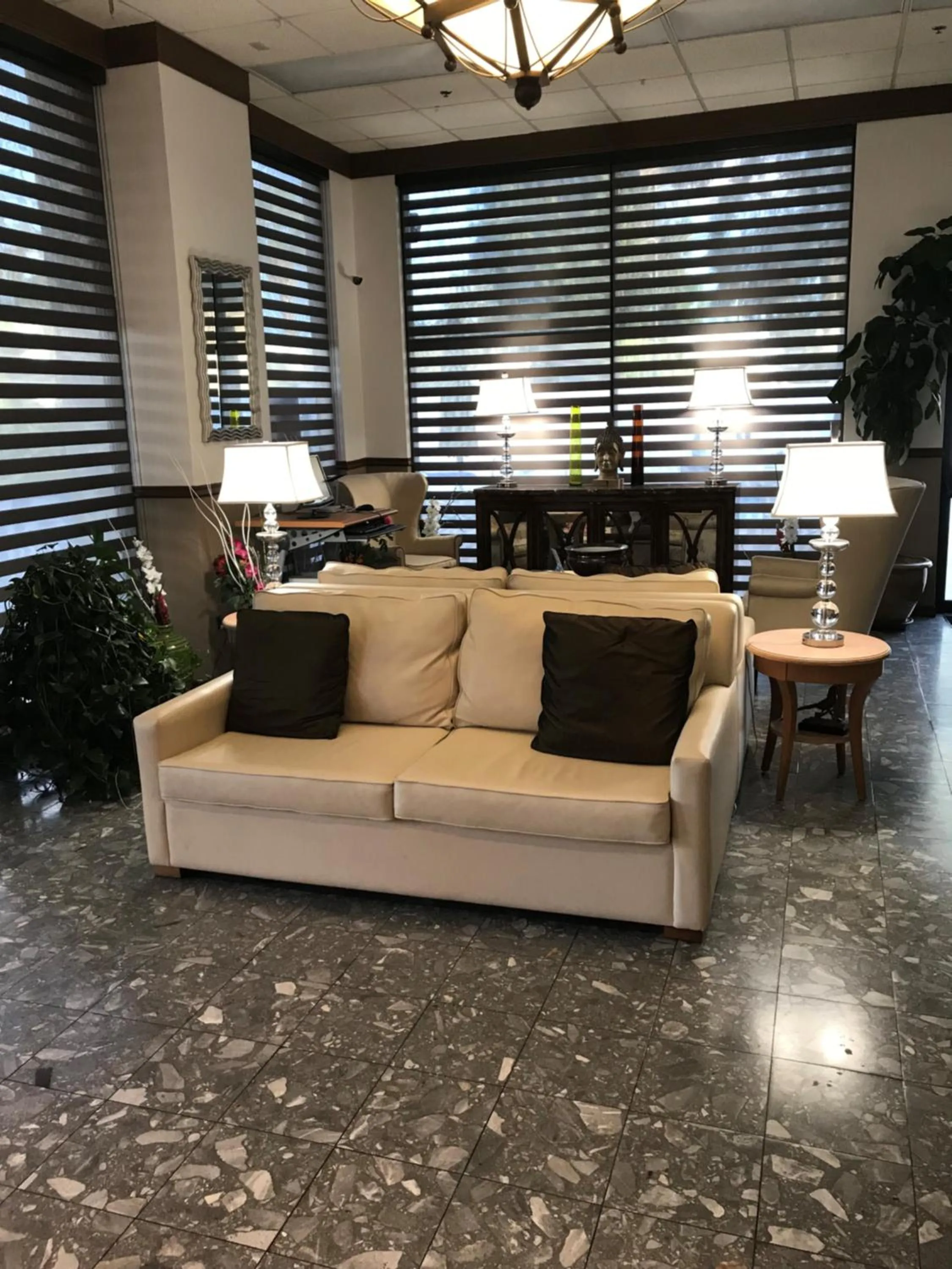 Lobby or reception in Days Inn by Wyndham N Orlando/Casselberry