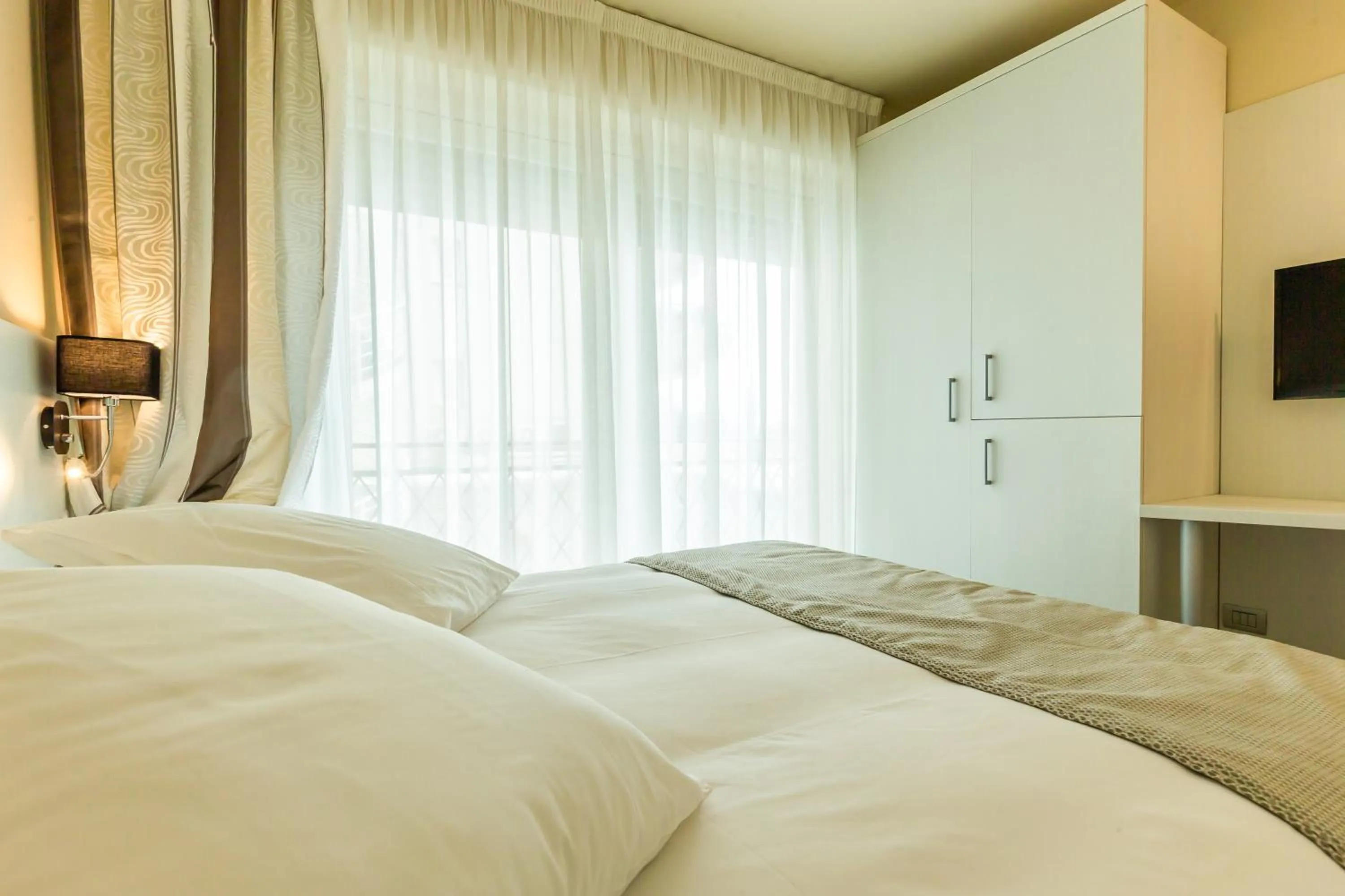 Bed in La Dolce Vita Hotel