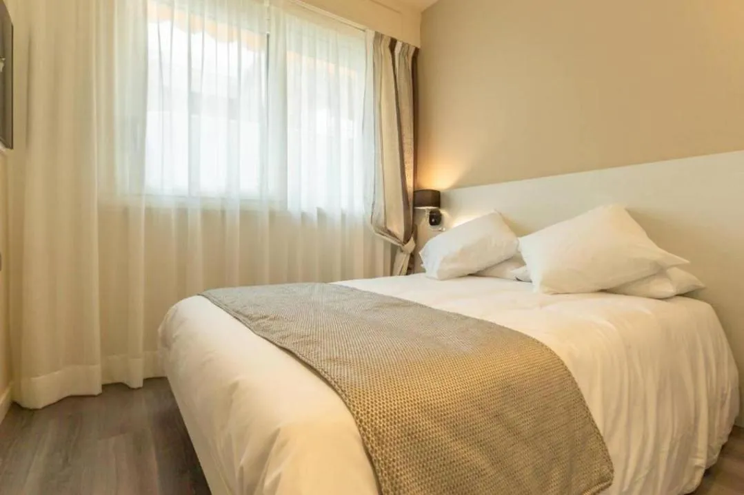 Bed in La Dolce Vita Hotel