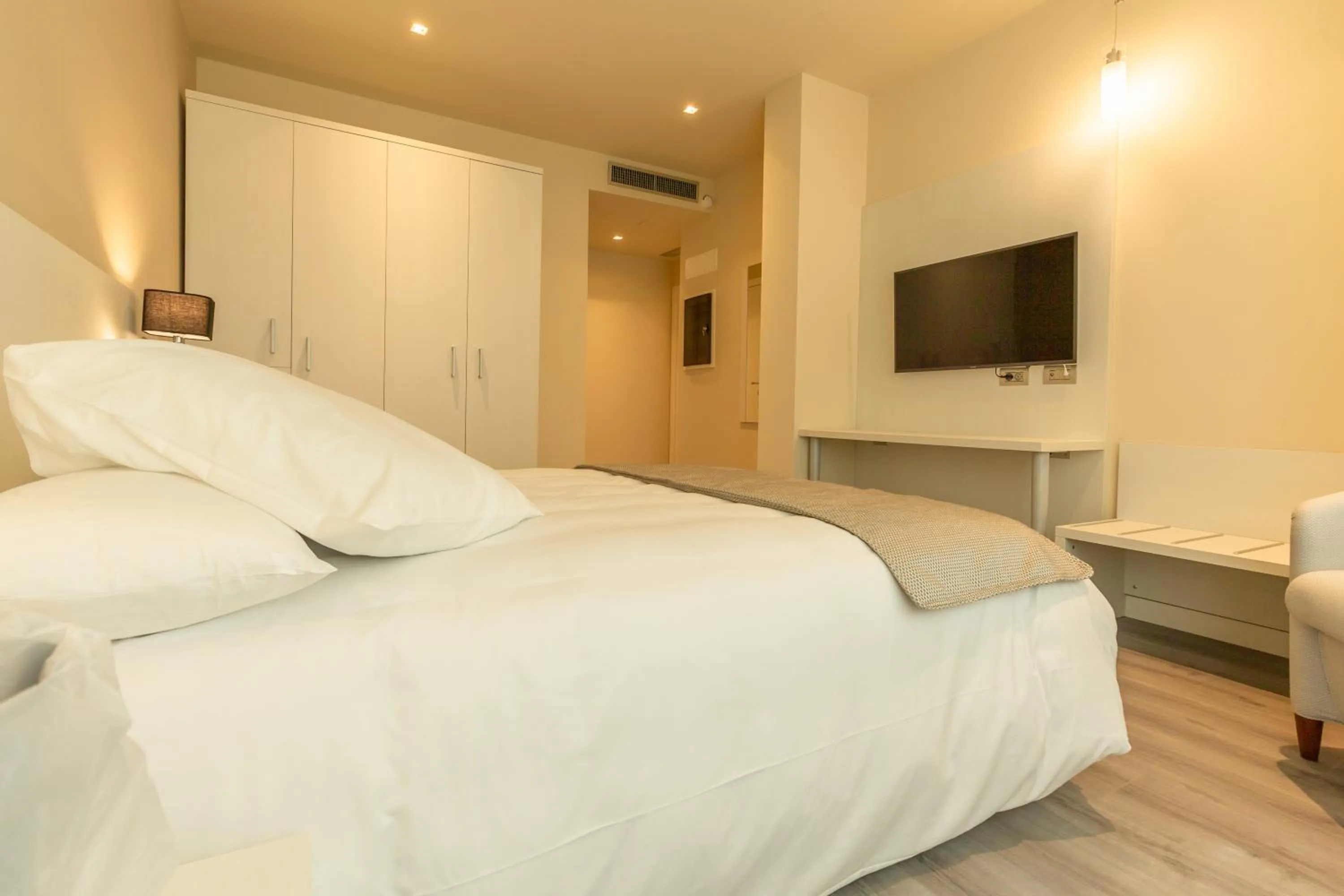 Bed in La Dolce Vita Hotel