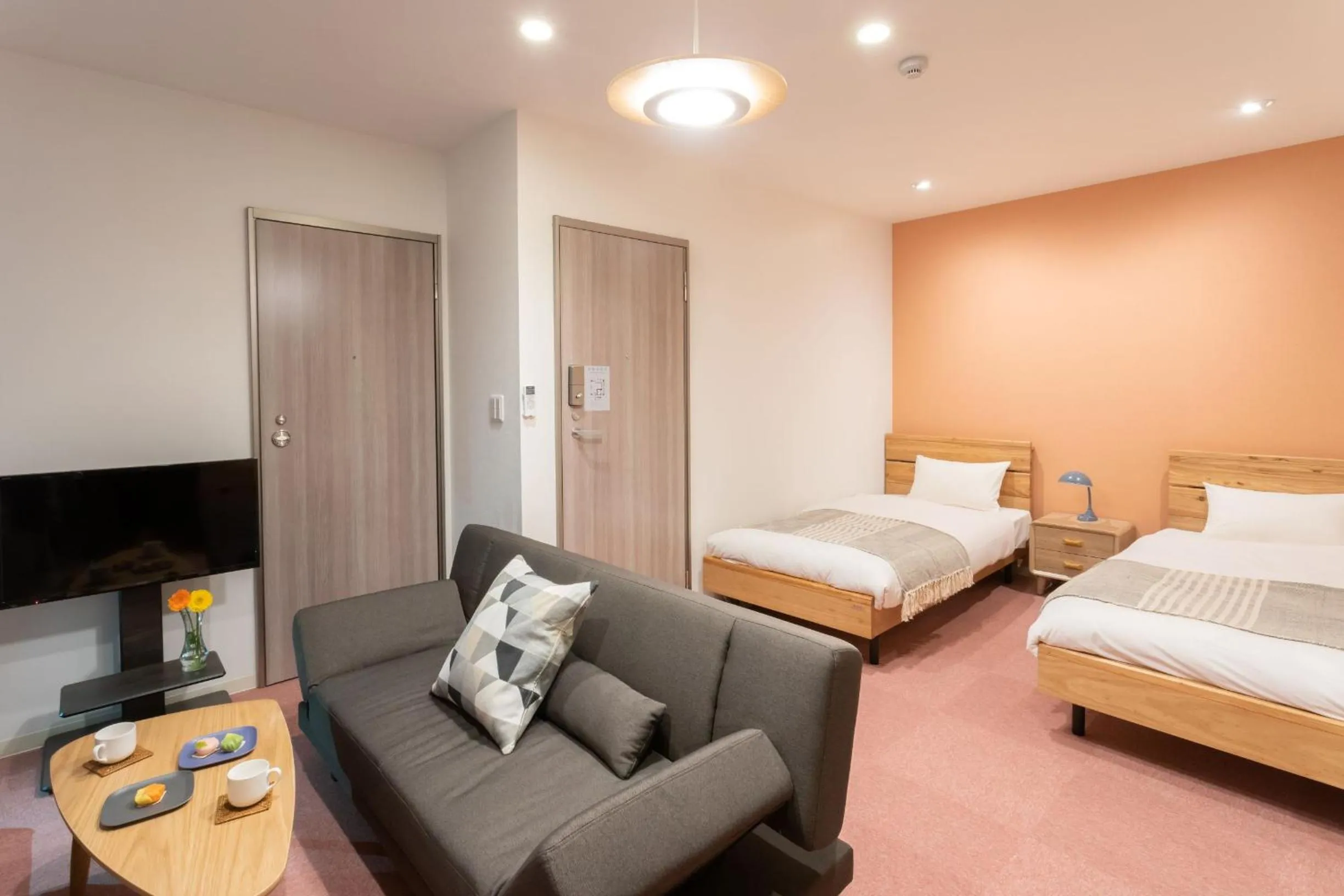 Seating area, Bed in Playsis East Tokyo