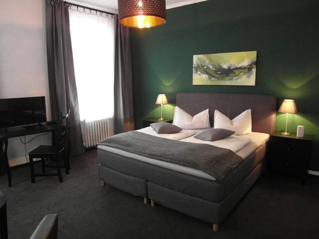 Bed in Hotel Frankfurter Hof