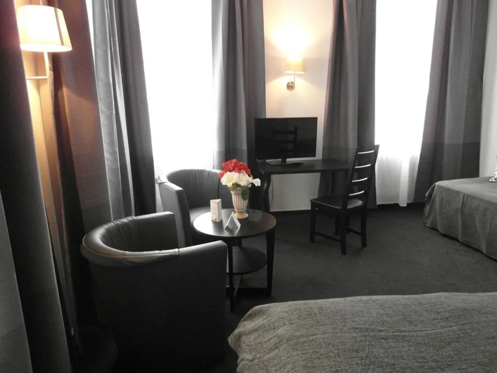 Bed in Hotel Frankfurter Hof