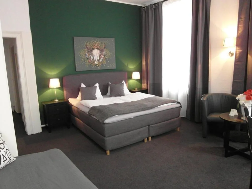 Bed in Hotel Frankfurter Hof