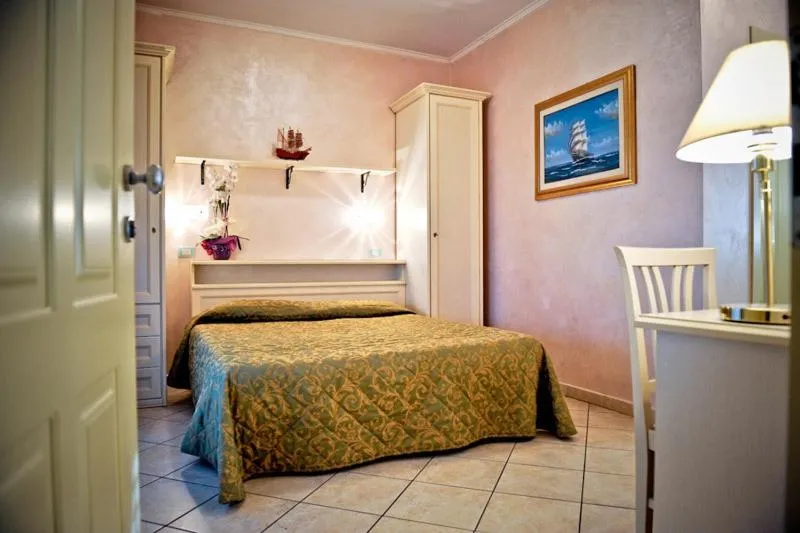 Bed in Hotel Residence Veliero