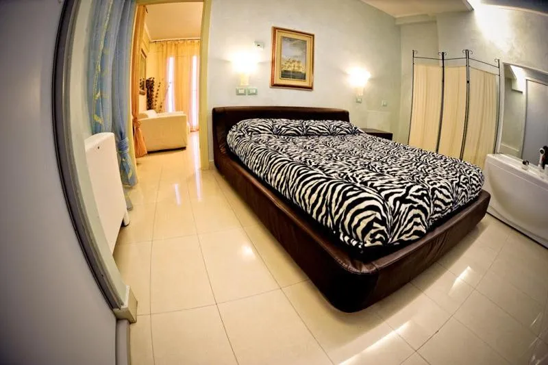 Bed in Hotel Residence Veliero