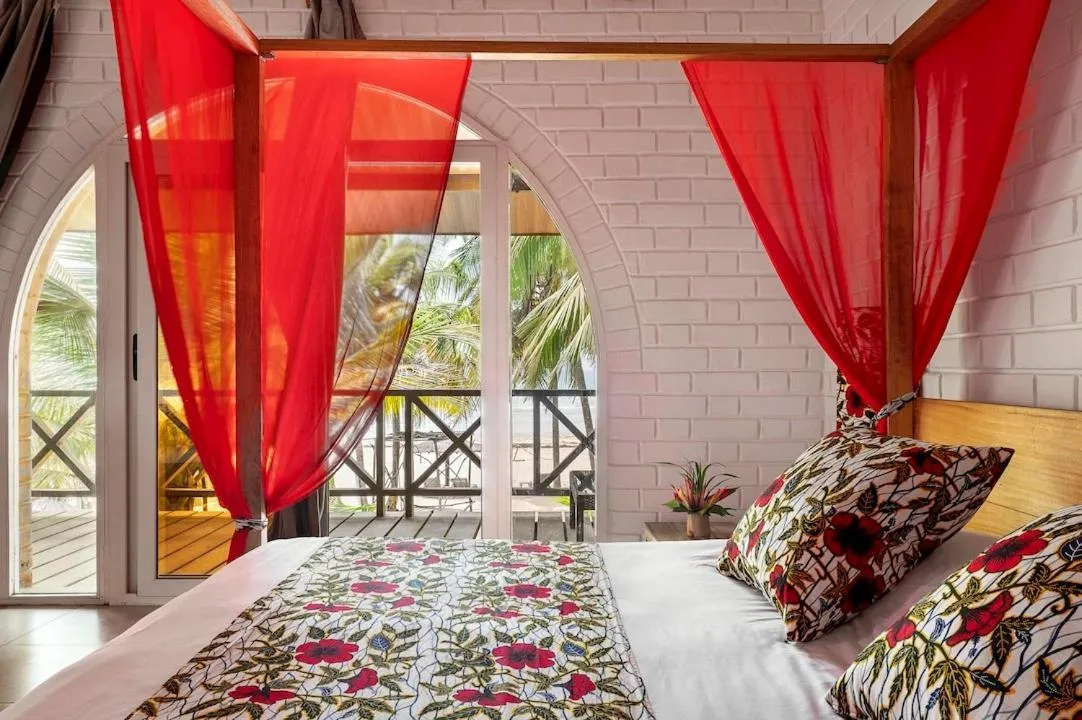 Balcony/Terrace, Bed in Hotel Coucoue Lodge