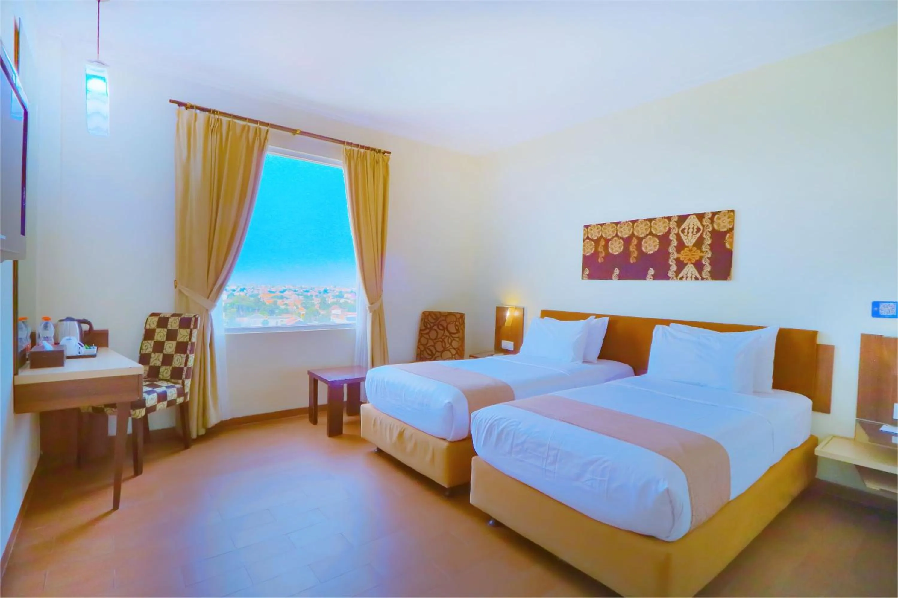 Bathroom, Bed in Hotel Dafam Pekalongan