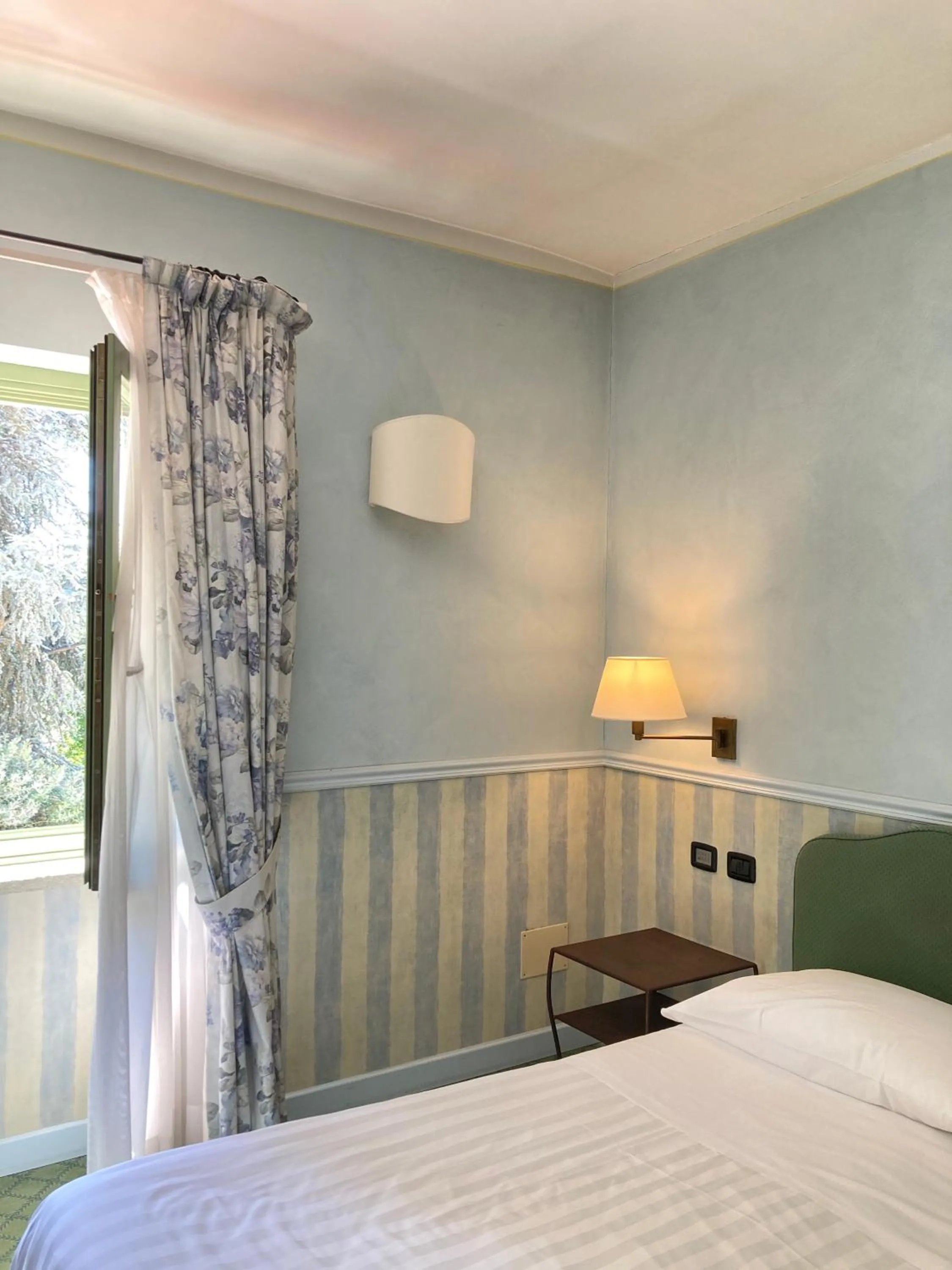 Bed in Locanda Maison Verte