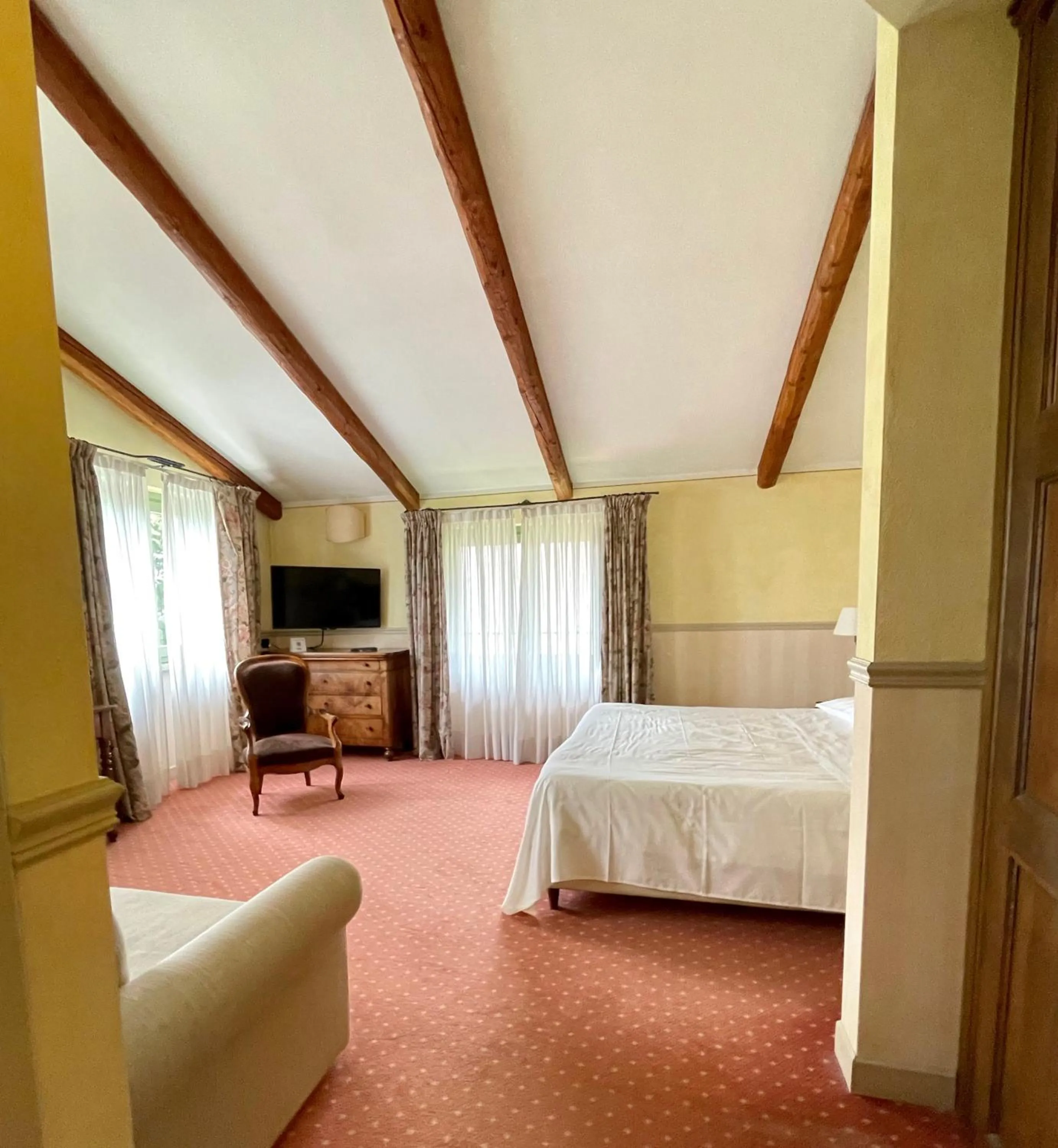 Bed in Locanda Maison Verte