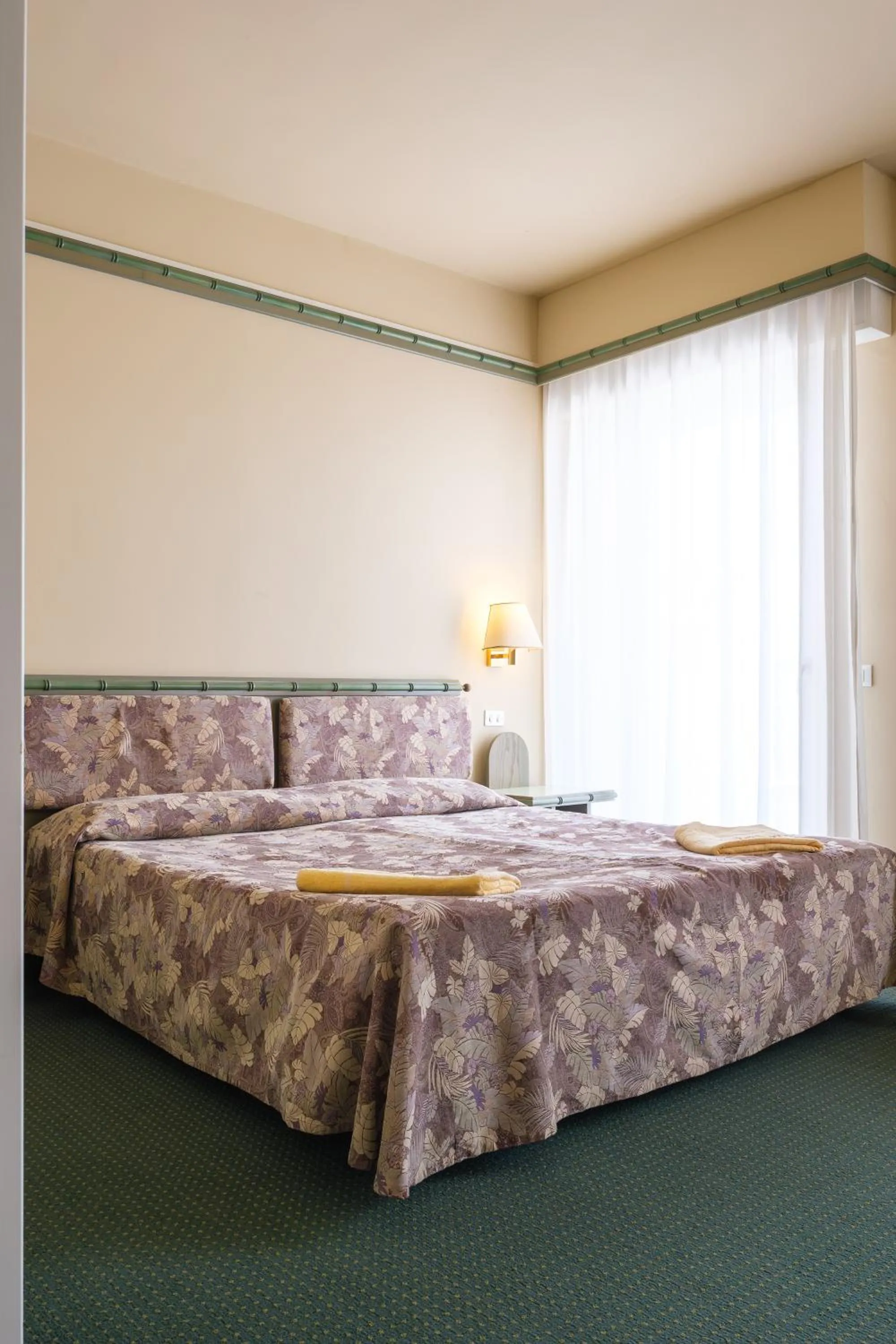 Bed in Hotel Montecarlo