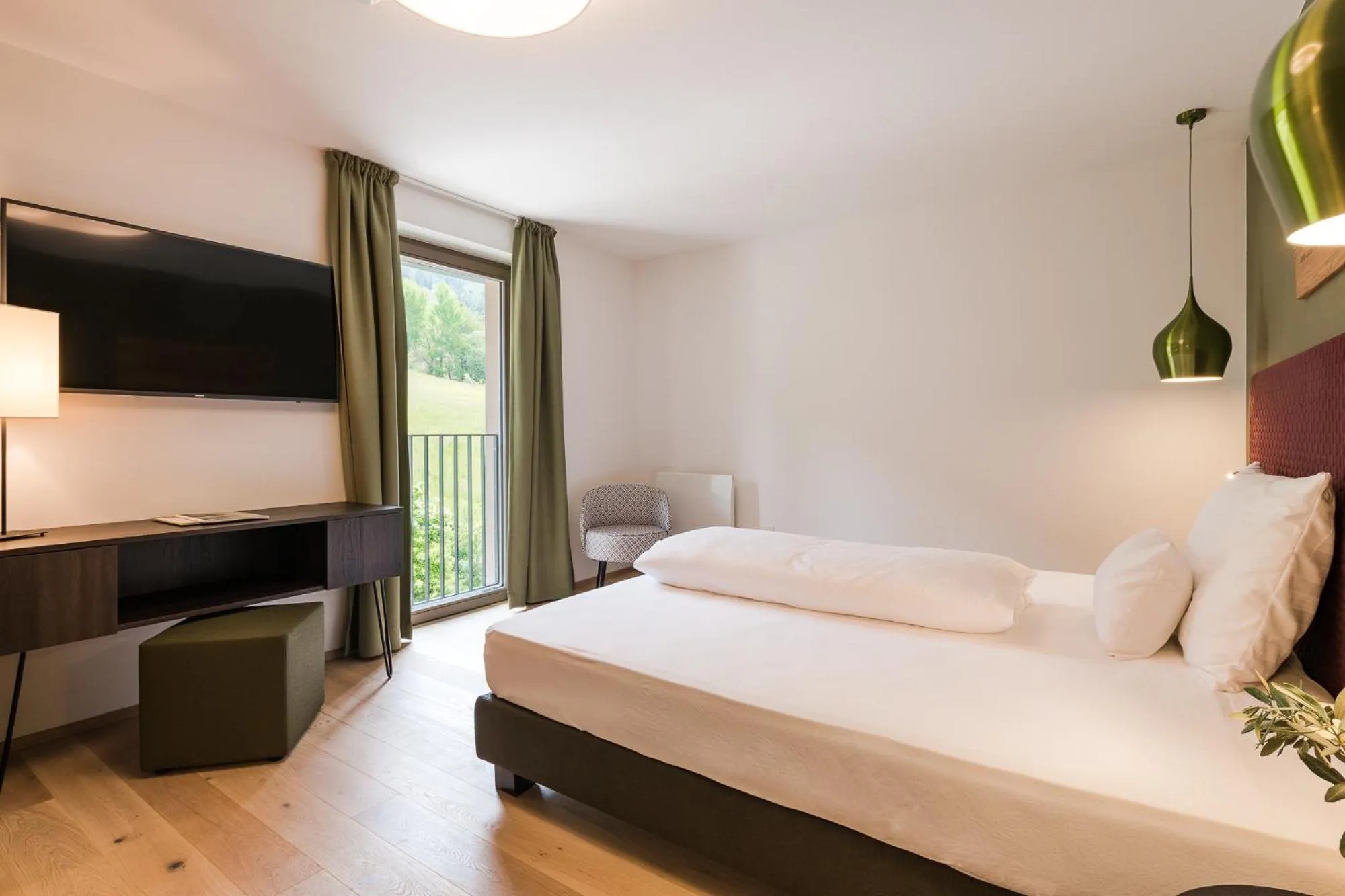 Bed in Oliven- & Genusshotel Hirzer