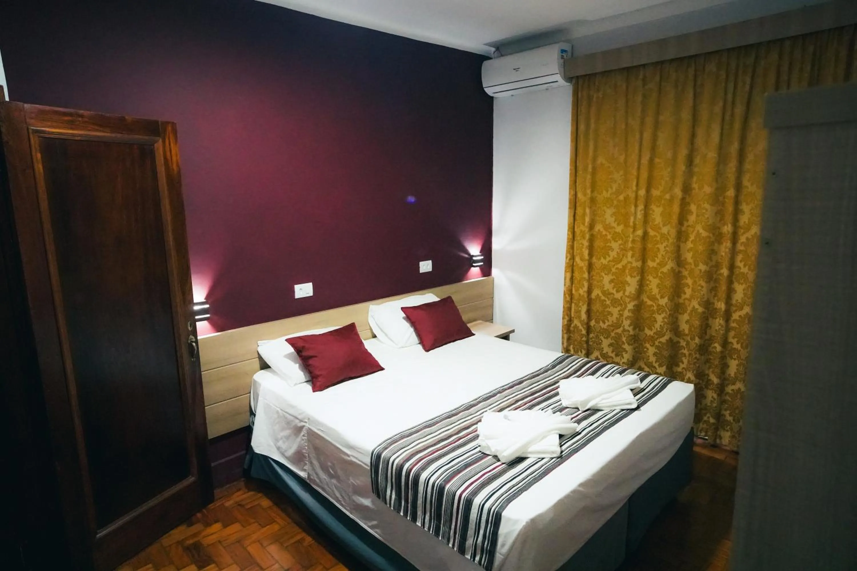 Bedroom, Bed in Hotel Euro Suite Poços de Caldas By Nacional Inn