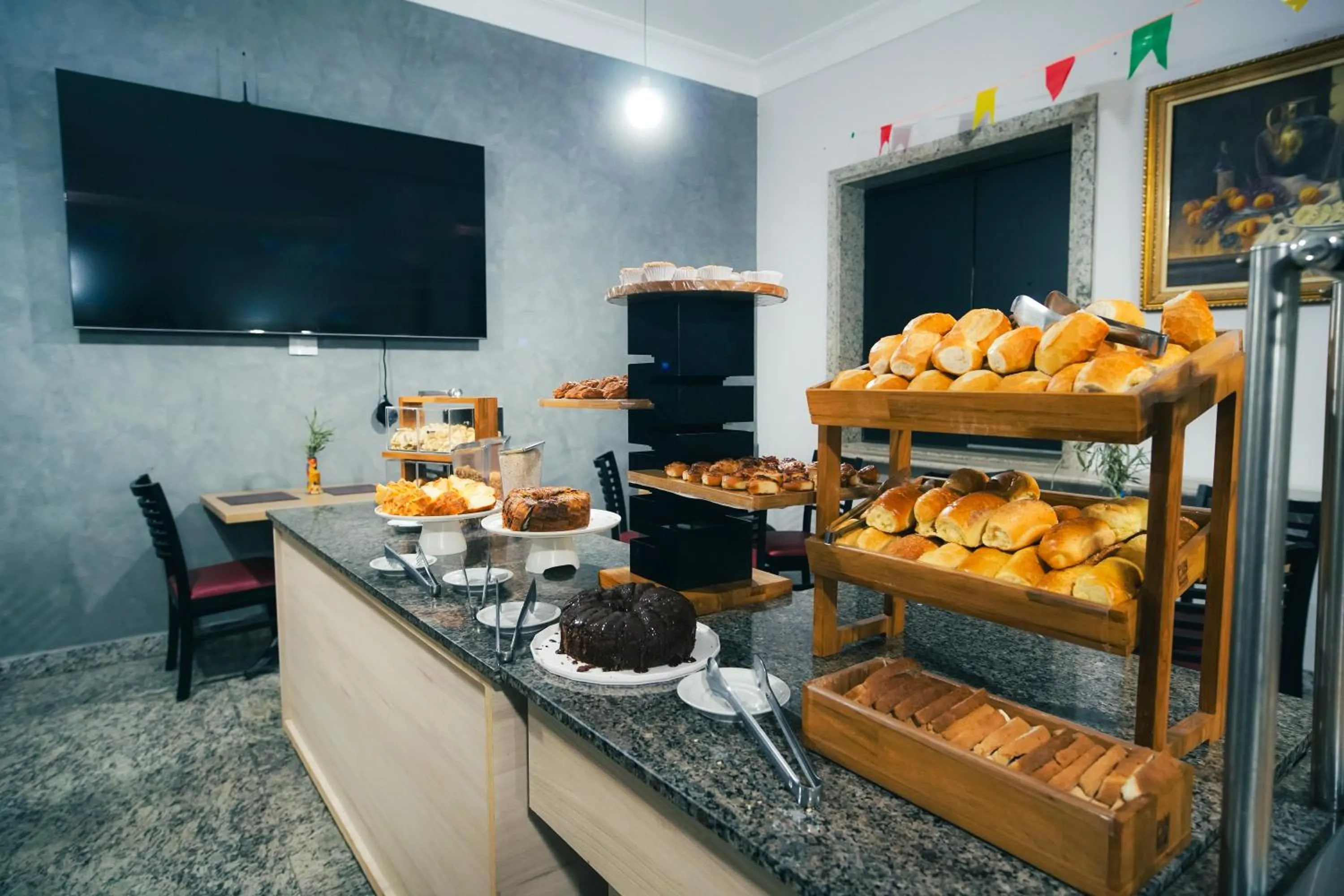 Restaurant/places to eat in Hotel Euro Suite Poços de Caldas By Nacional Inn