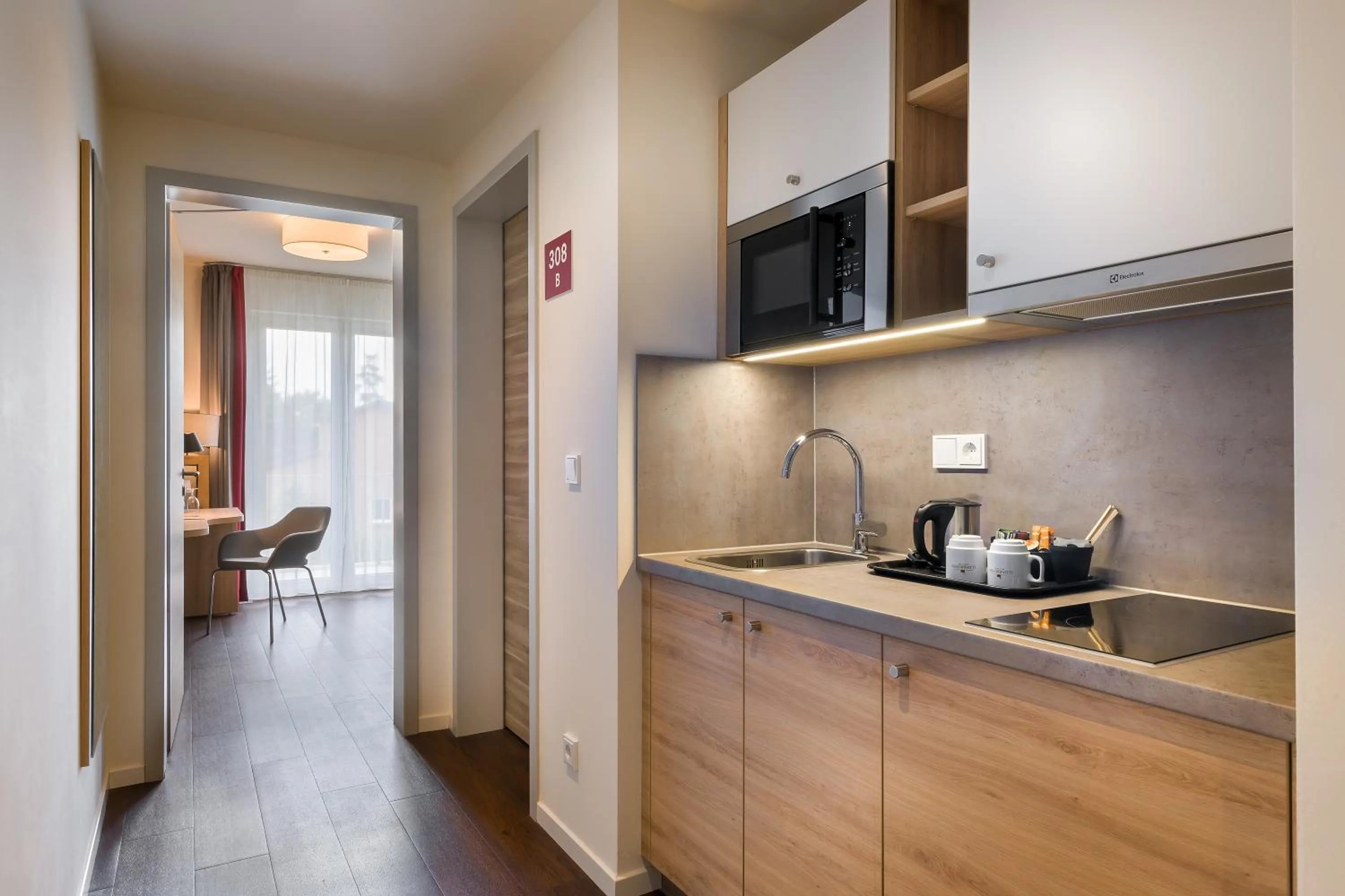 Kitchen or kitchenette in Signature East Hotel Apartment