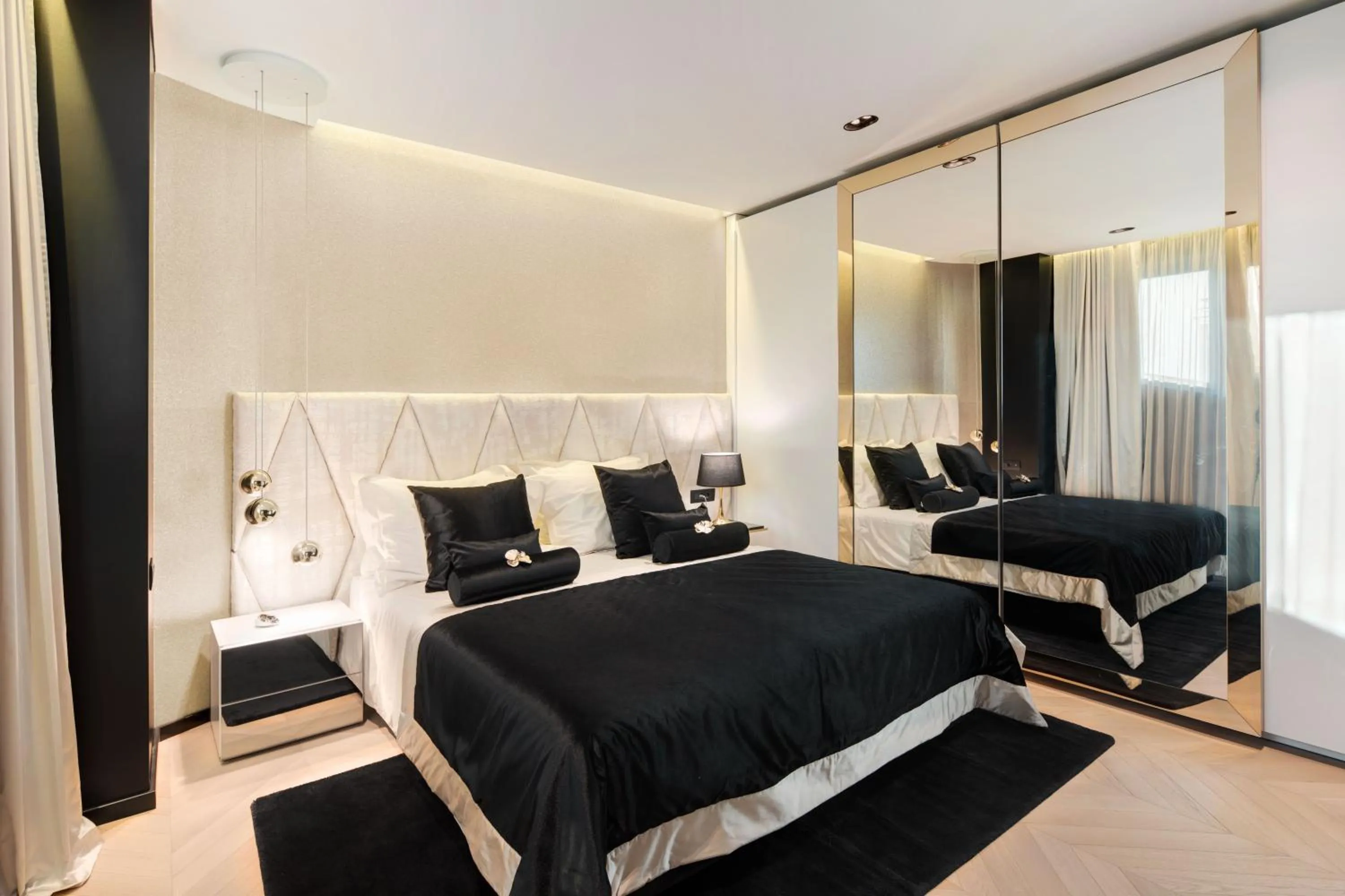 Bed in Posh Residence Luxury Suites