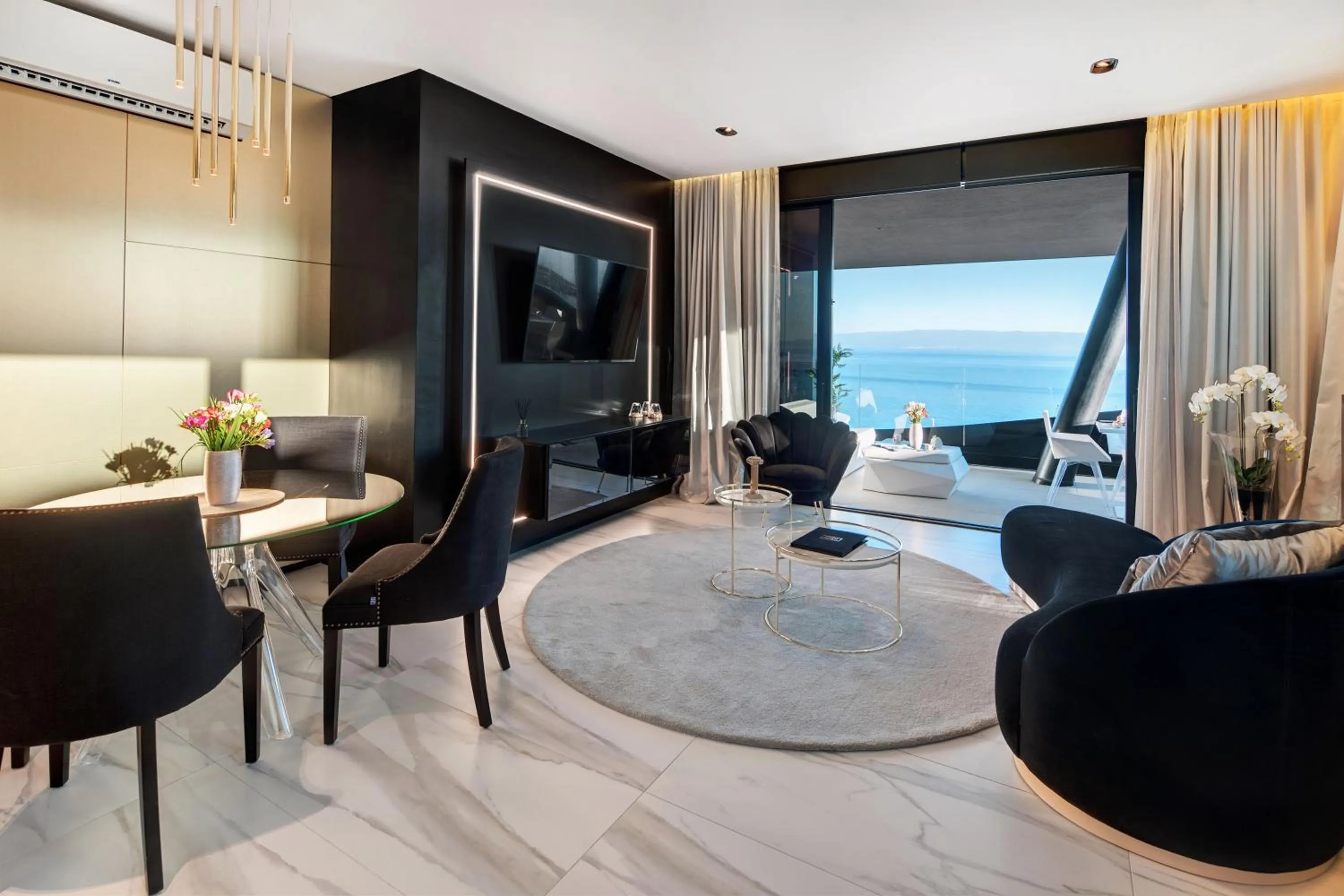 Living room in Posh Residence Luxury Suites