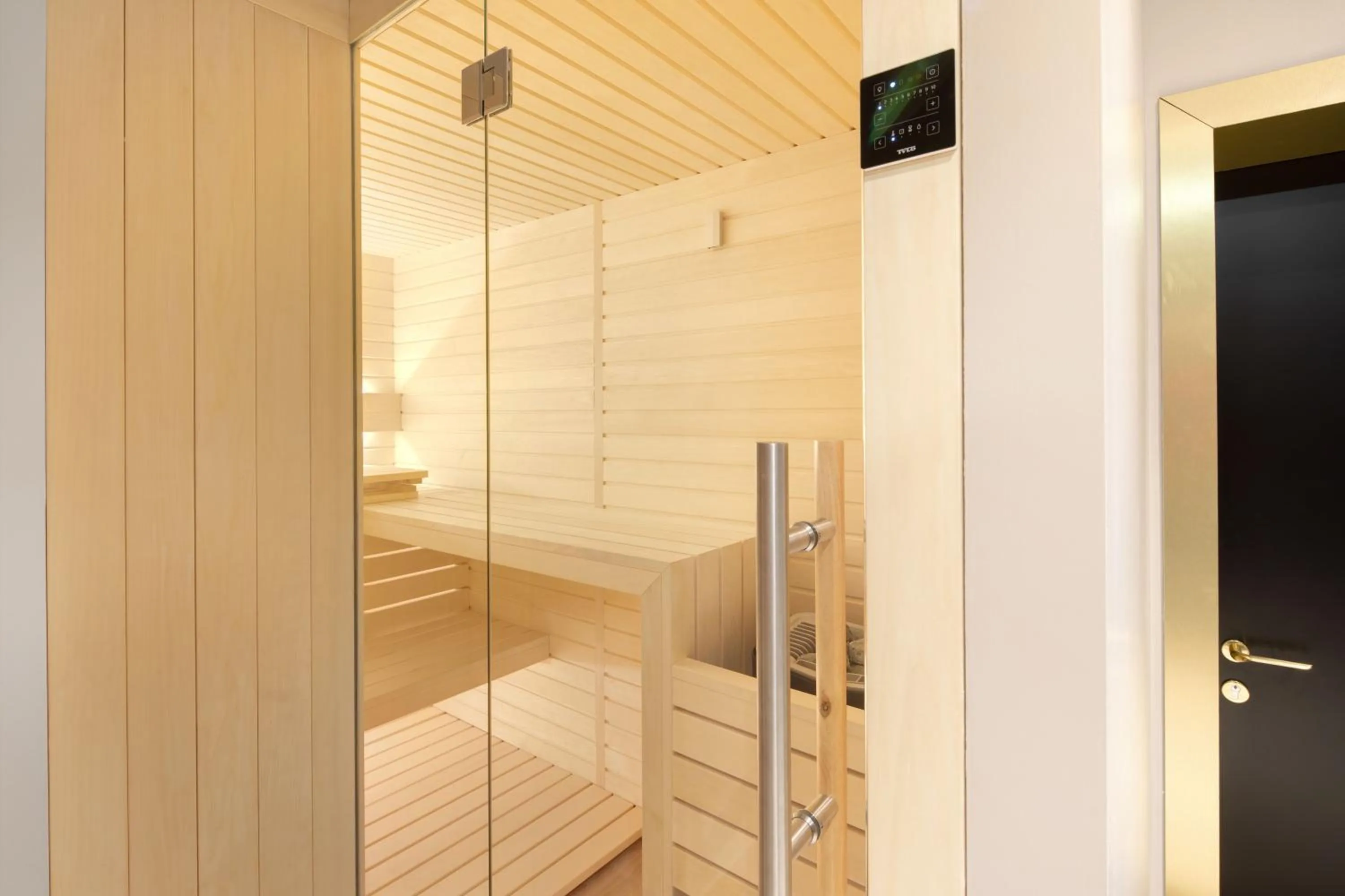 Sauna in Posh Residence Luxury Suites