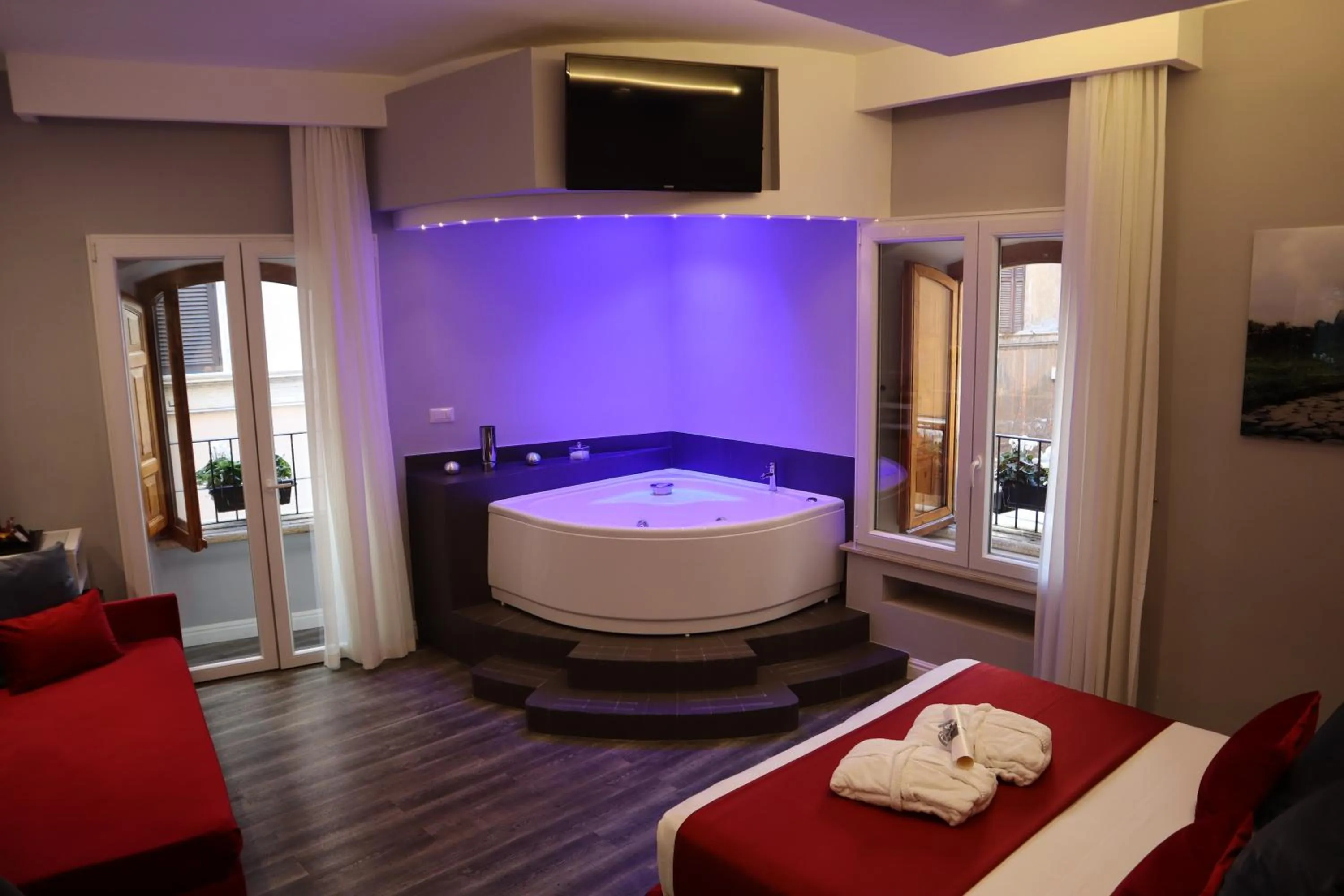 Photo of the whole room, Bed in MILLINA SUITES IN NAVONA