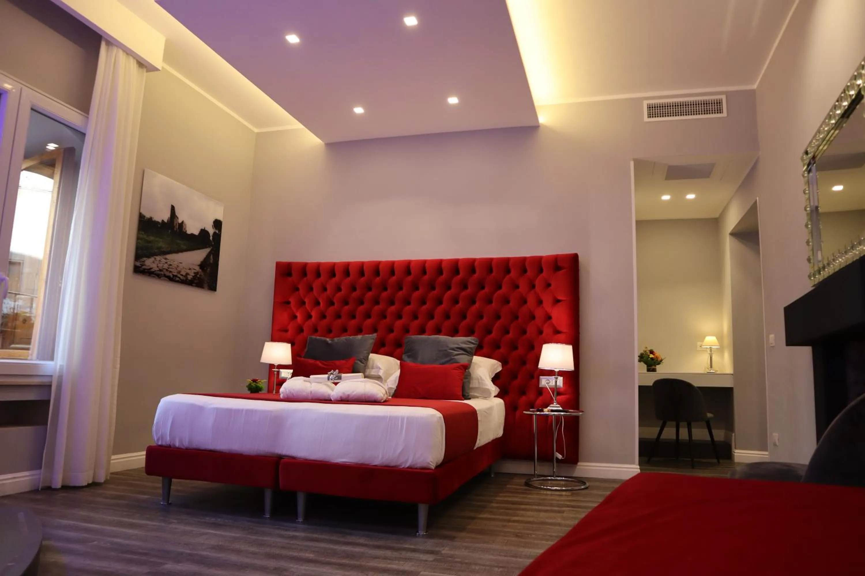 Photo of the whole room, Bed in MILLINA SUITES IN NAVONA