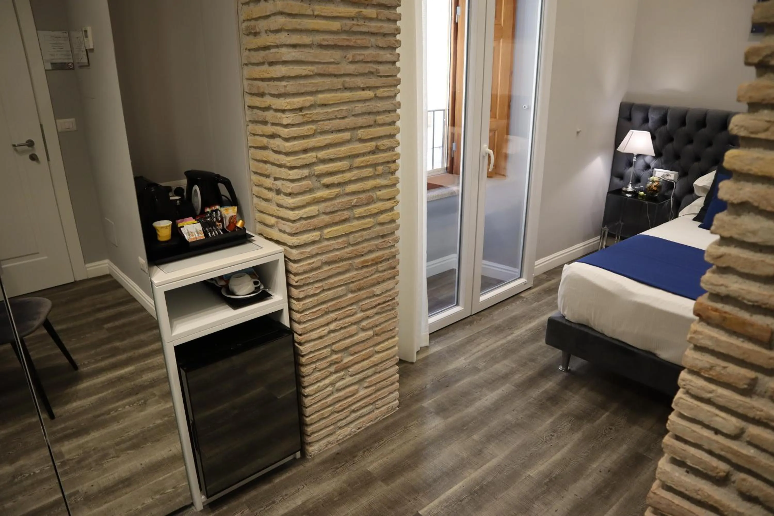 Photo of the whole room, Bed in MILLINA SUITES IN NAVONA