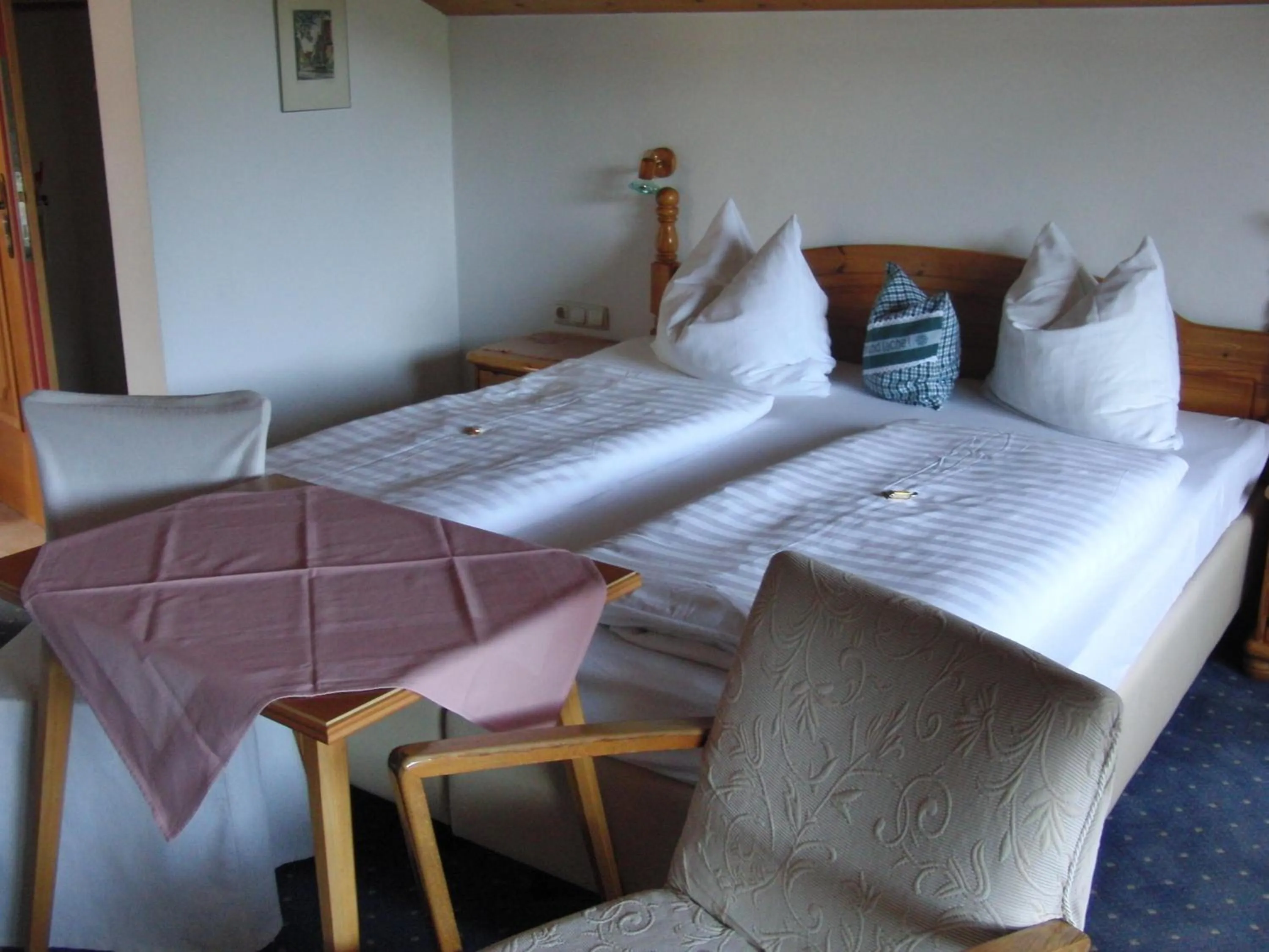 Bed in Hotel-Pension Heike