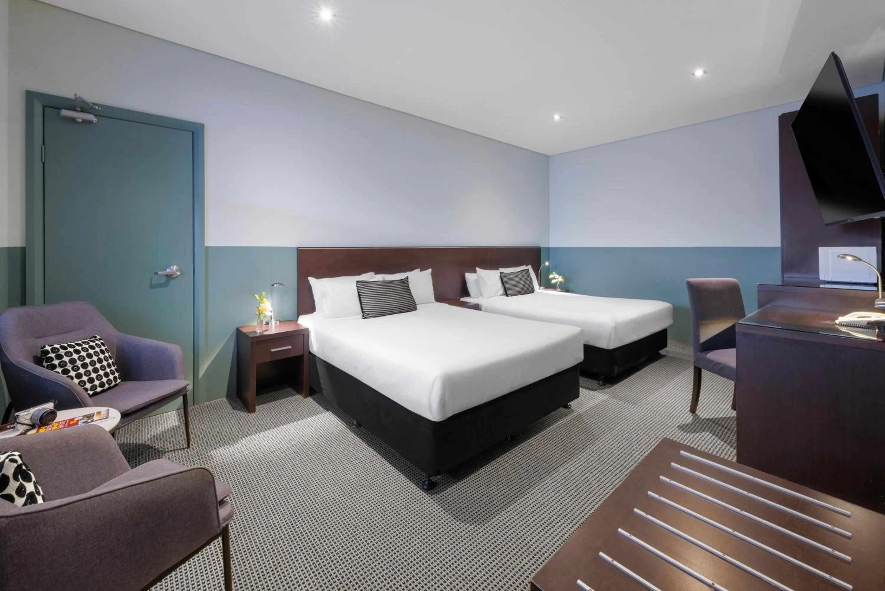 Bed in Vulcan Hotel Sydney
