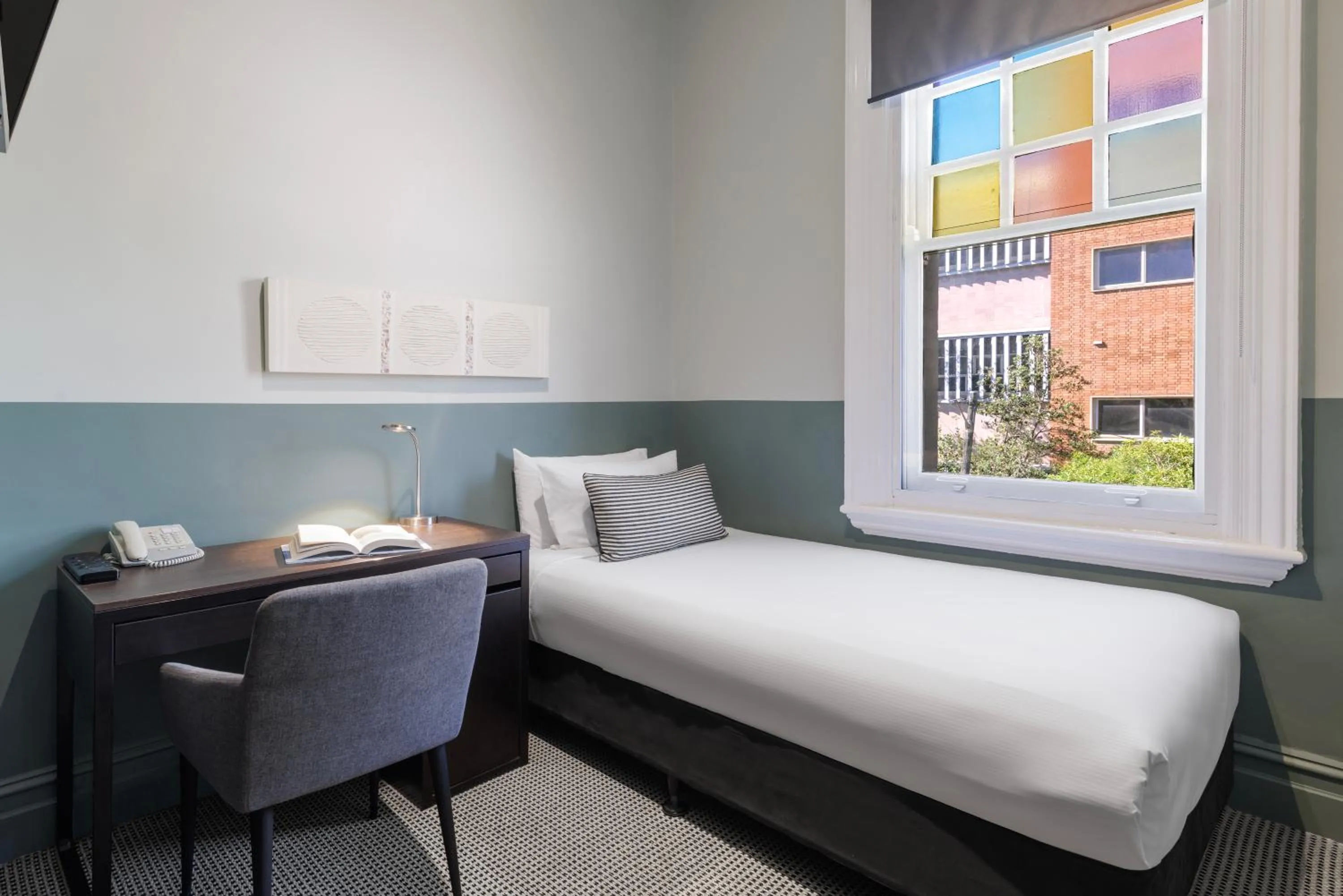 Bed in Vulcan Hotel Sydney