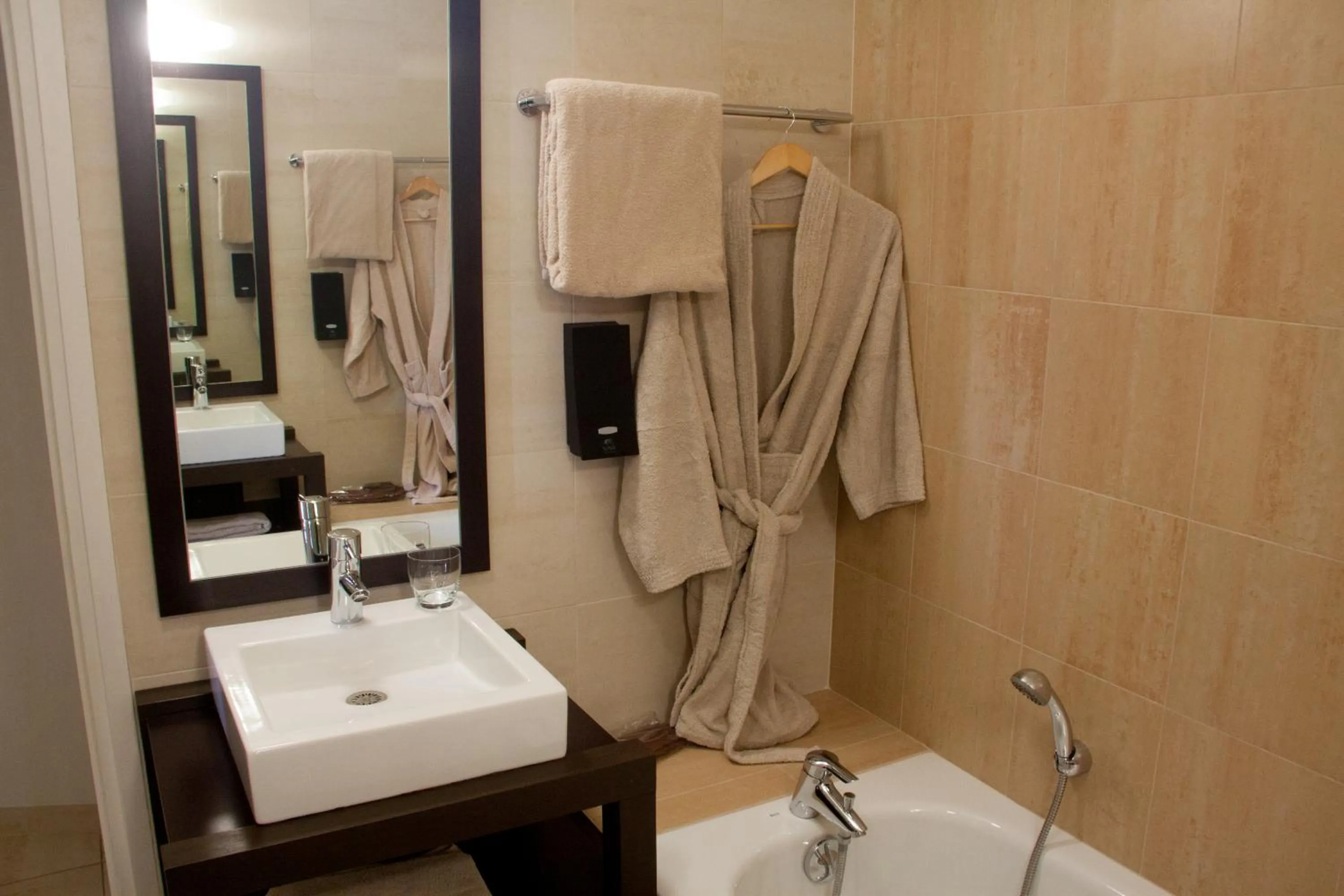 Bathroom in Logis Hôtel Terre de Loire