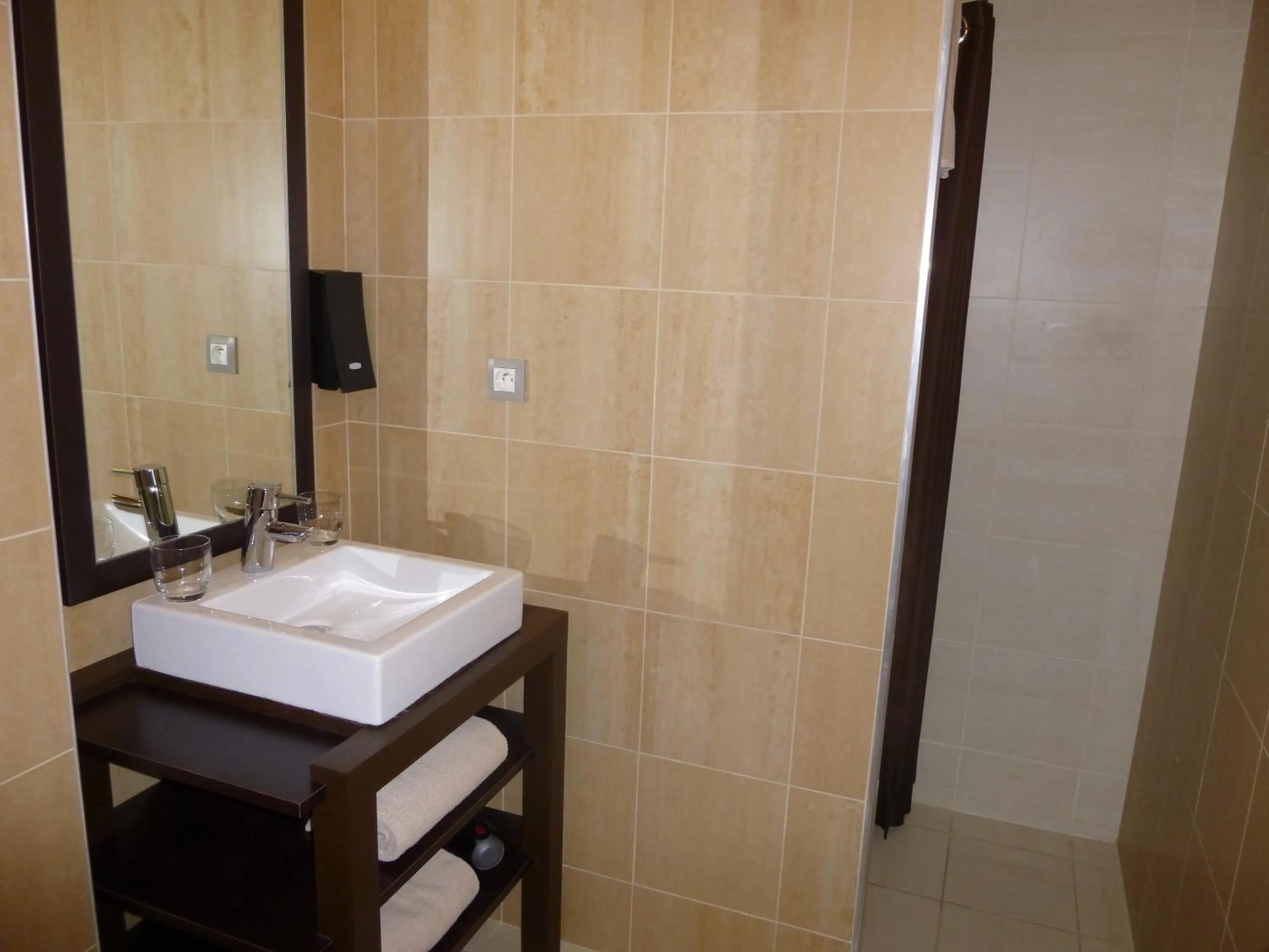 Bathroom in Logis Hôtel Terre de Loire