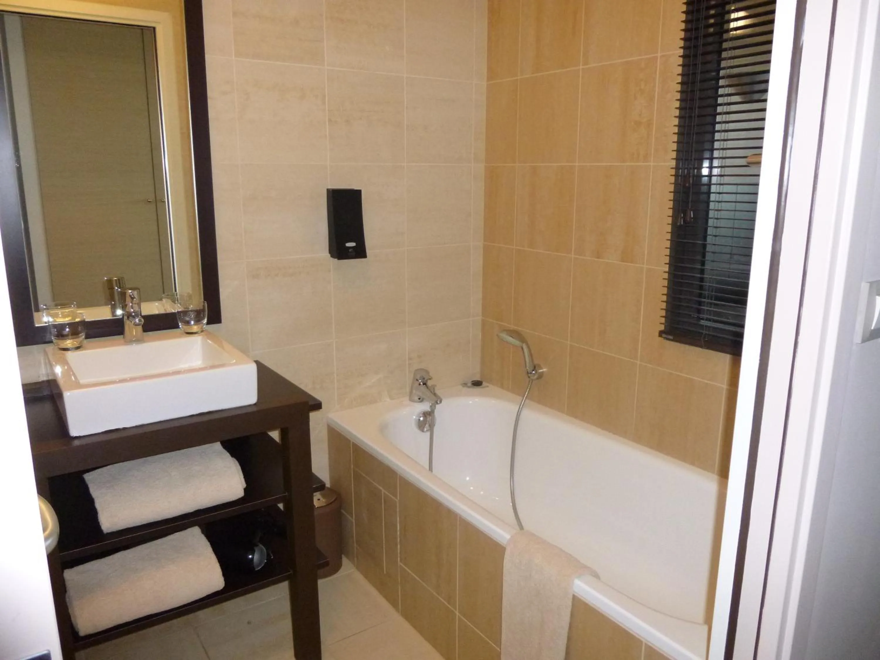 Bathroom in Logis Hôtel Terre de Loire