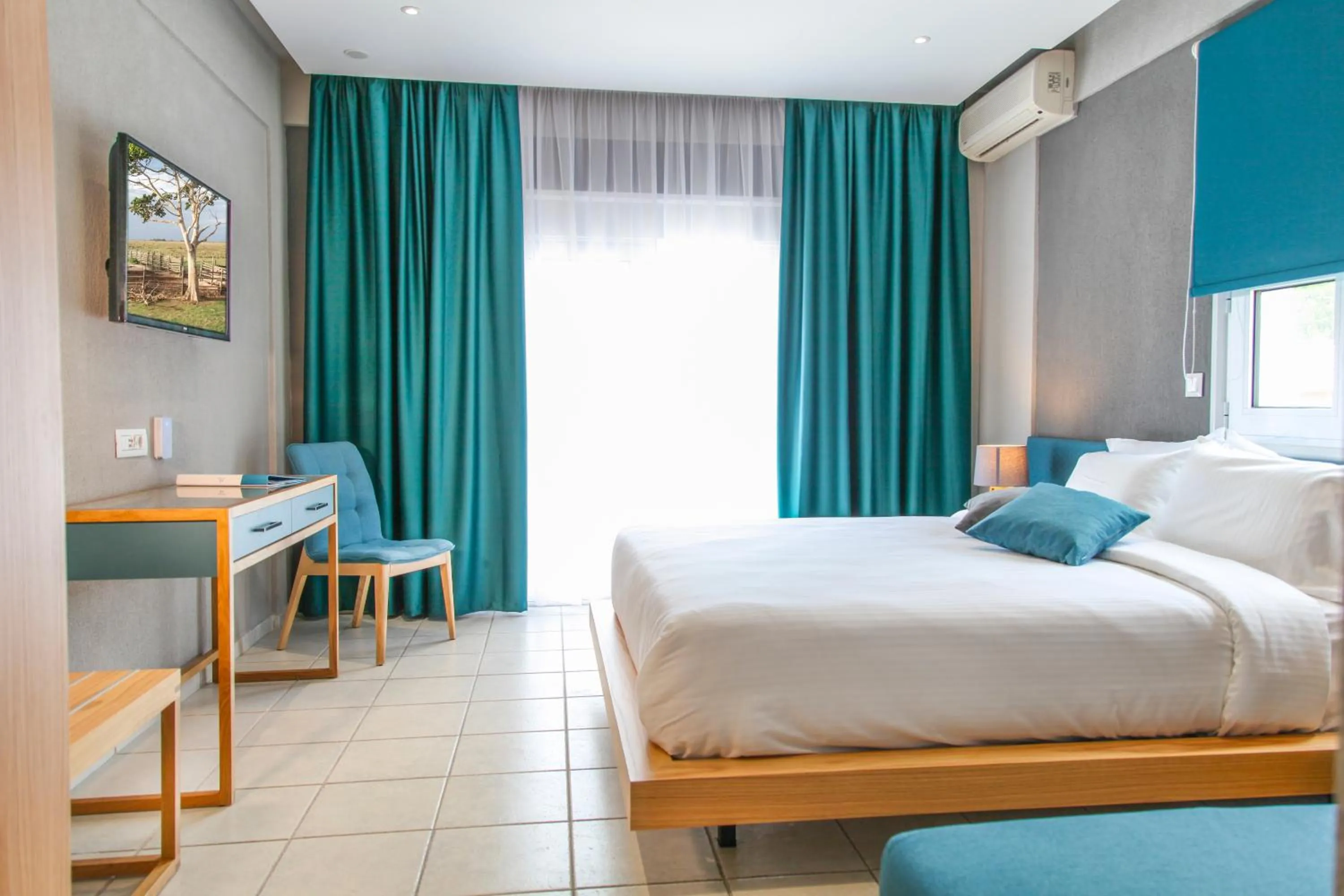 Bed in Royal Hotel and Suites