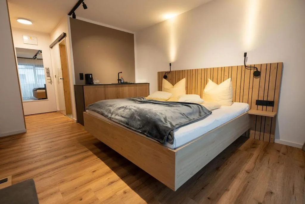 Bed in Haller's Posthotel