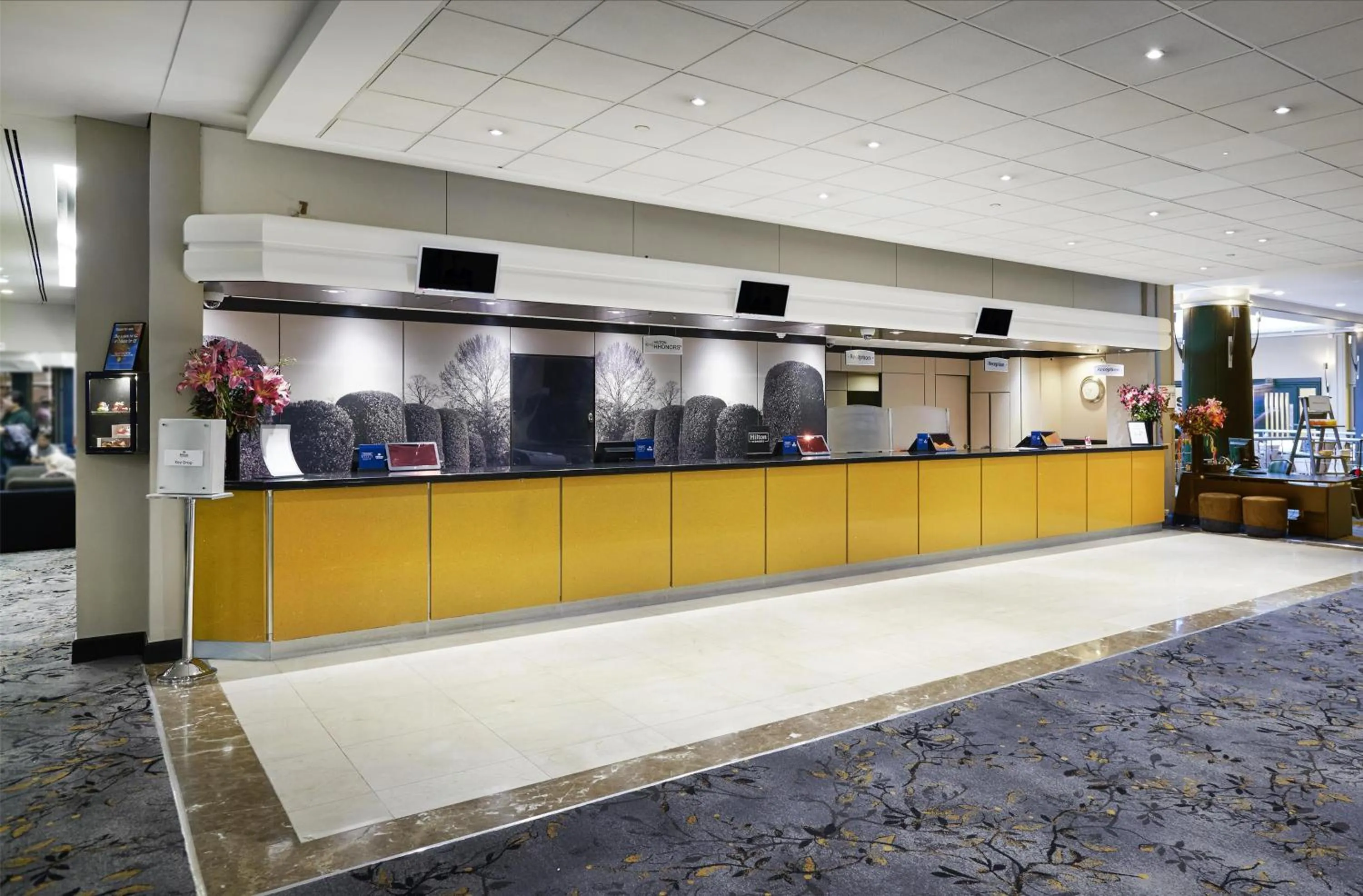 Lobby or reception in Hilton London Kensington Hotel